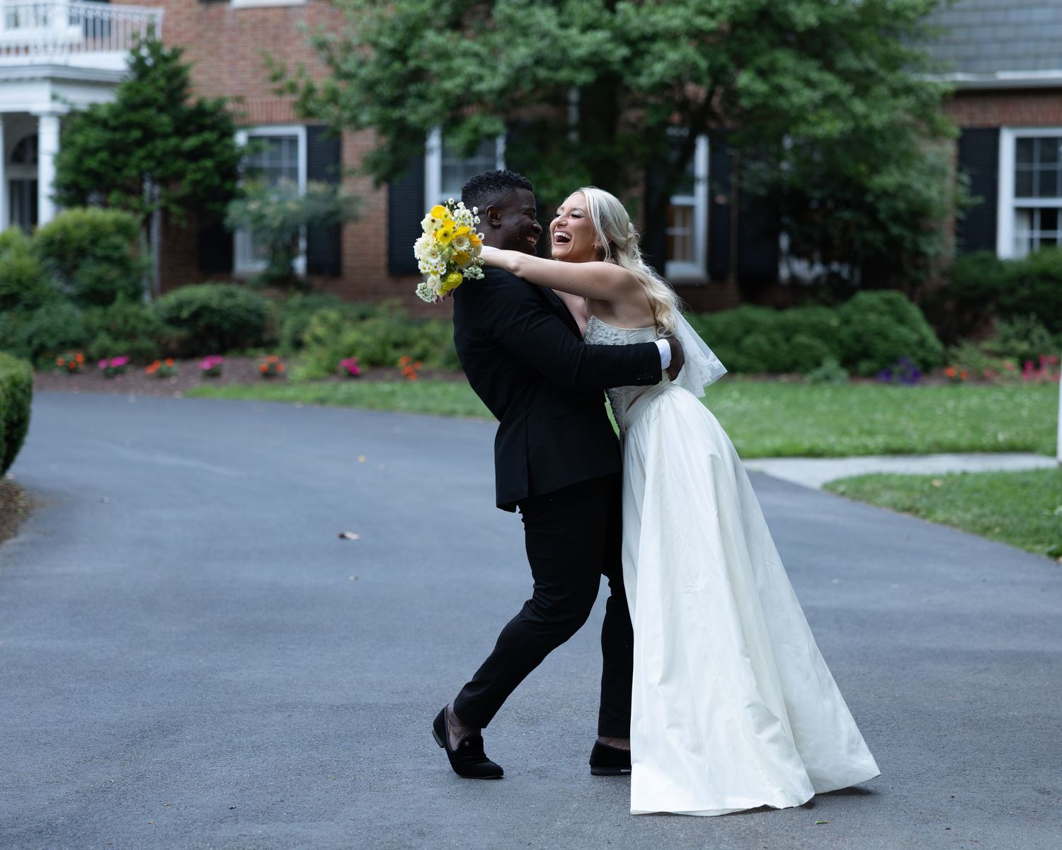 A bride in a white wedding dress poses playfully in a series of connected photos on a paved path.