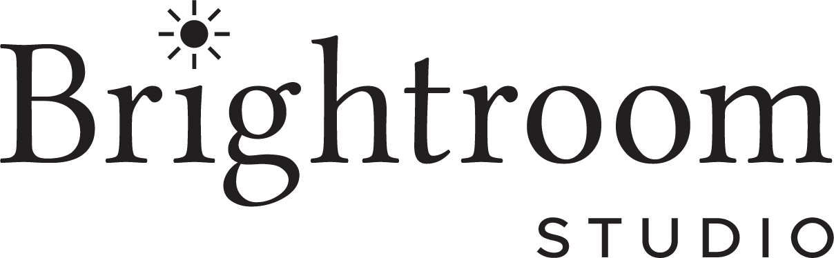 Brightroom Studio logo featuring elegant serif typography with a decorative sun icon above the letter B.