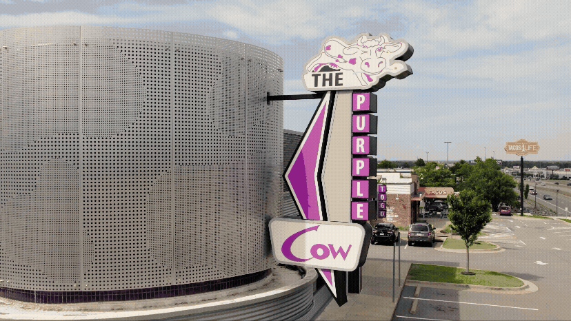Aerial drone view of a business building called Purple Cow for a branding video.