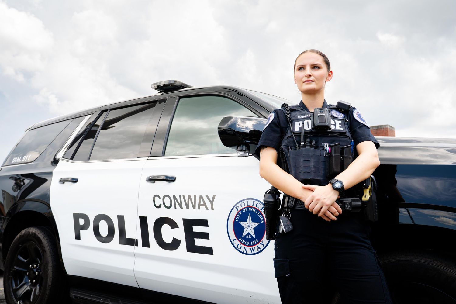 Police patrol vehicles parked outside Conway Police Department.