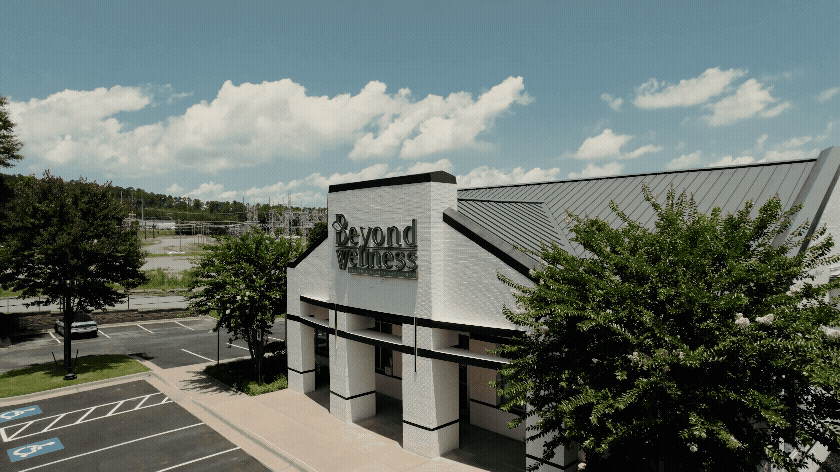 Aerial drone view of a business building called Beyond Wellness for a branding video.