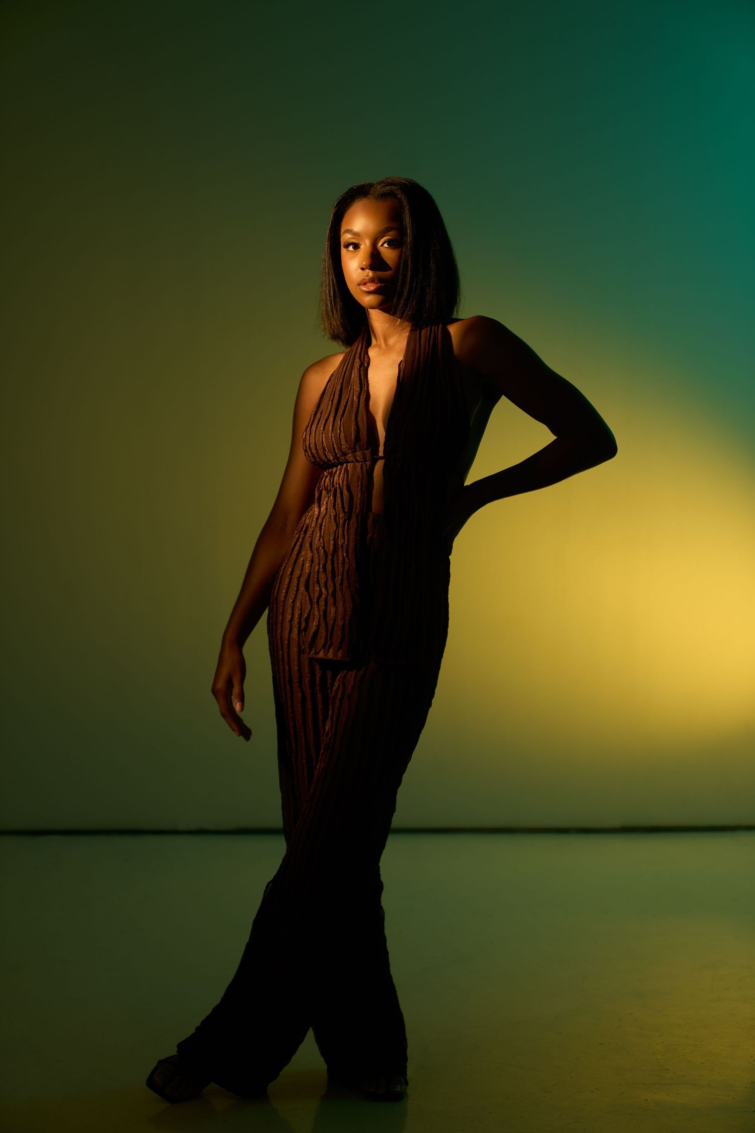 Fashion photography sequence showing dynamic poses in moody lighting.