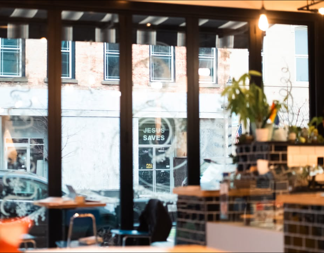 Modern office interior with large windows and contemporary workspace design. coffee shop. modern coffee house. photography. downtown.
