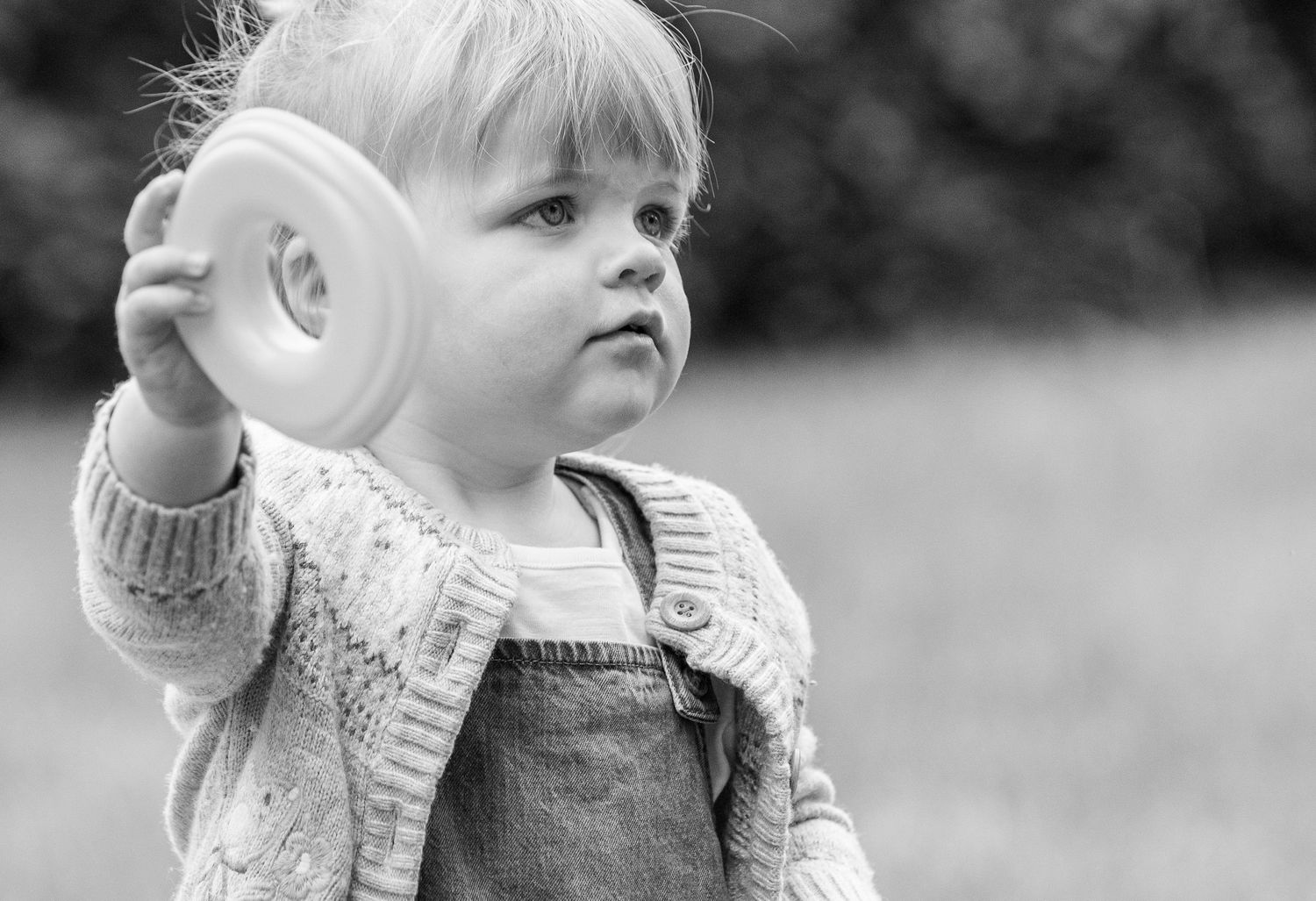 A black and white candid shot showing natural expressions and gestures.