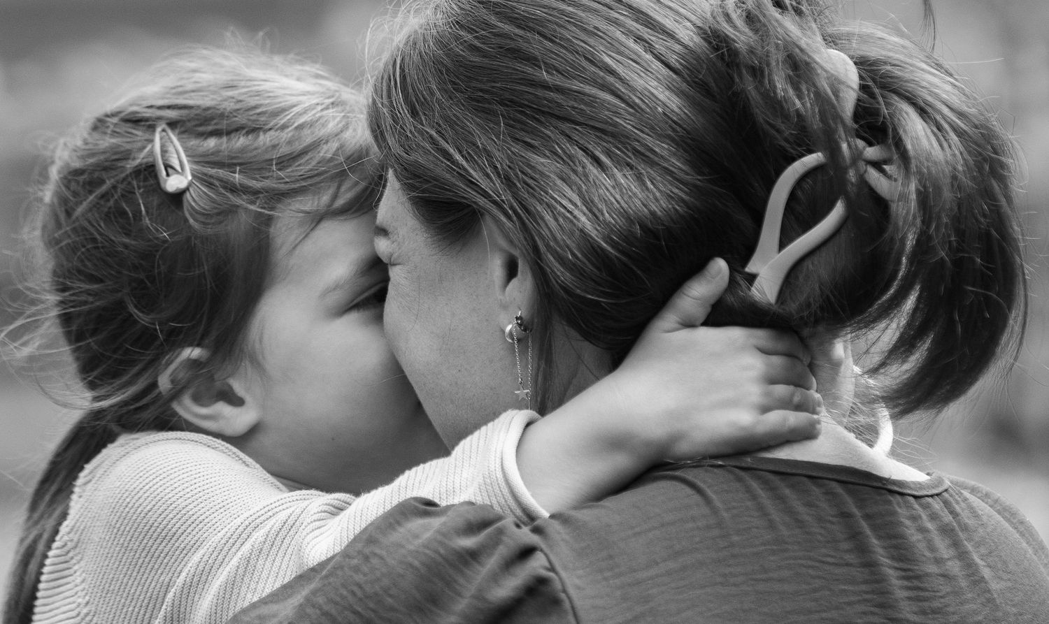 Series of intimate black and white portrait shots showing closeness.