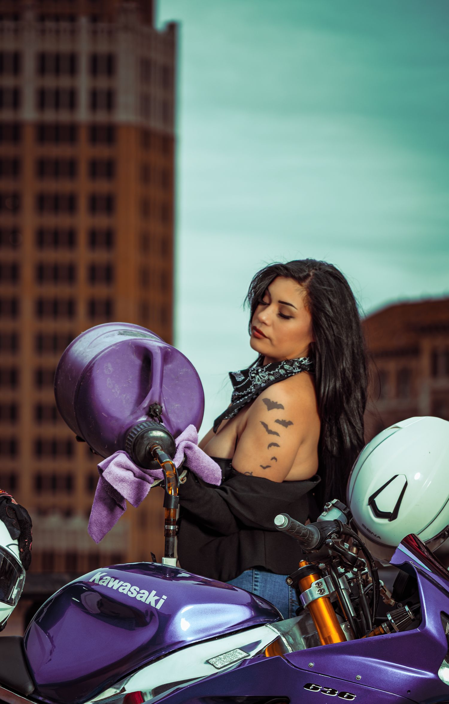 Three similar motorcycle photos showing a purple and white Kawasaki sportbike against an urban backdrop.