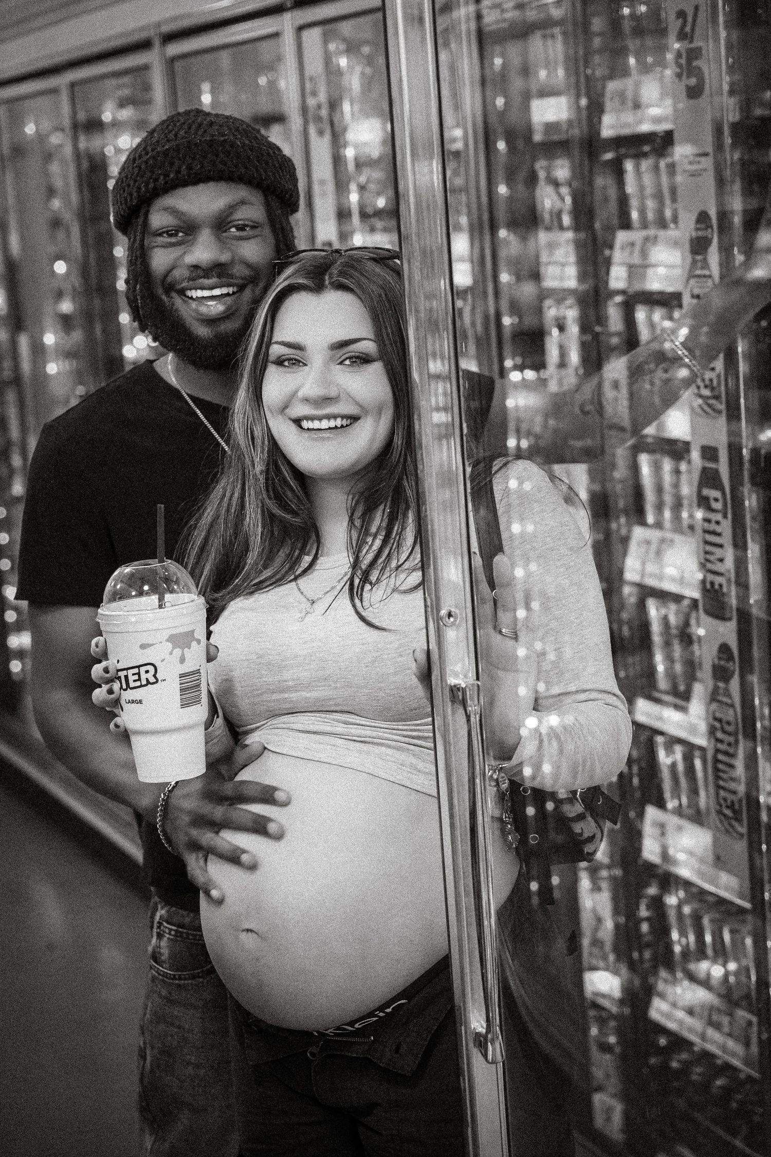 A series of four black and white photos showing people enjoying drinks in front of a convenience store cooler display.