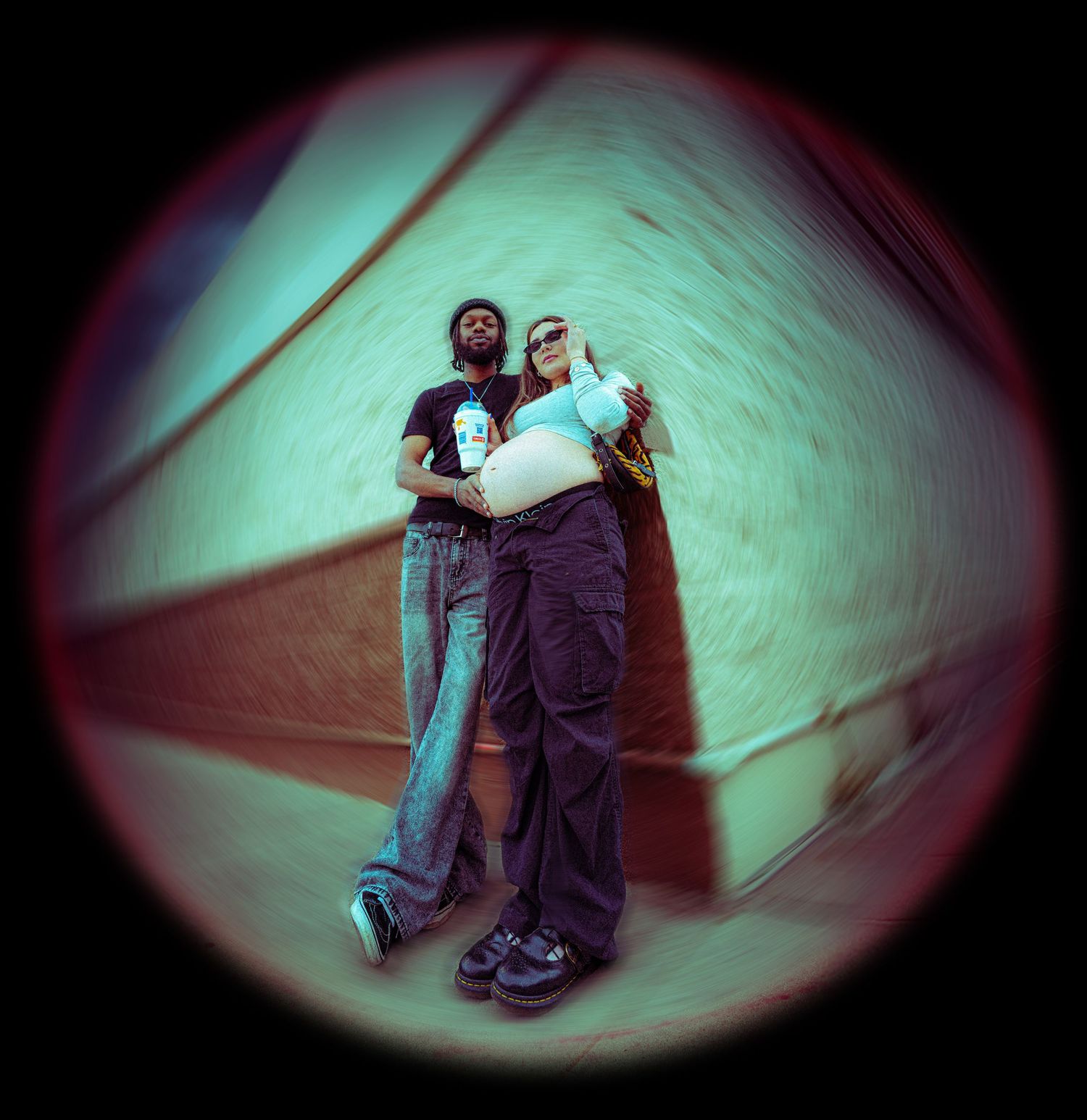 A series of fisheye lens photos showing two people embracing in a dark tunnel with green lighting effects.