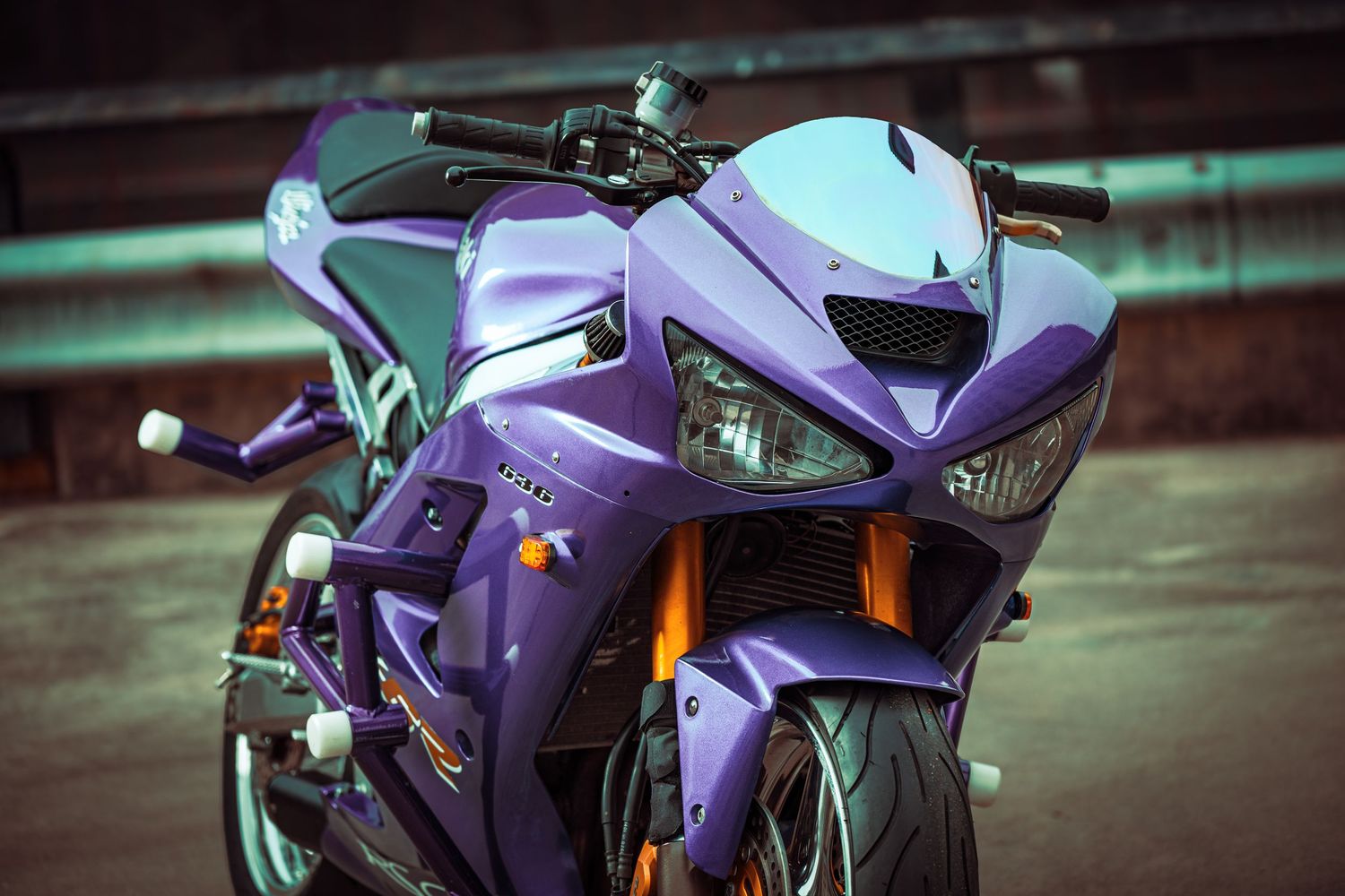 Purple Yamaha R6 motorcycle shown from multiple angles highlighting its sleek sport bike design and aerodynamic styling.