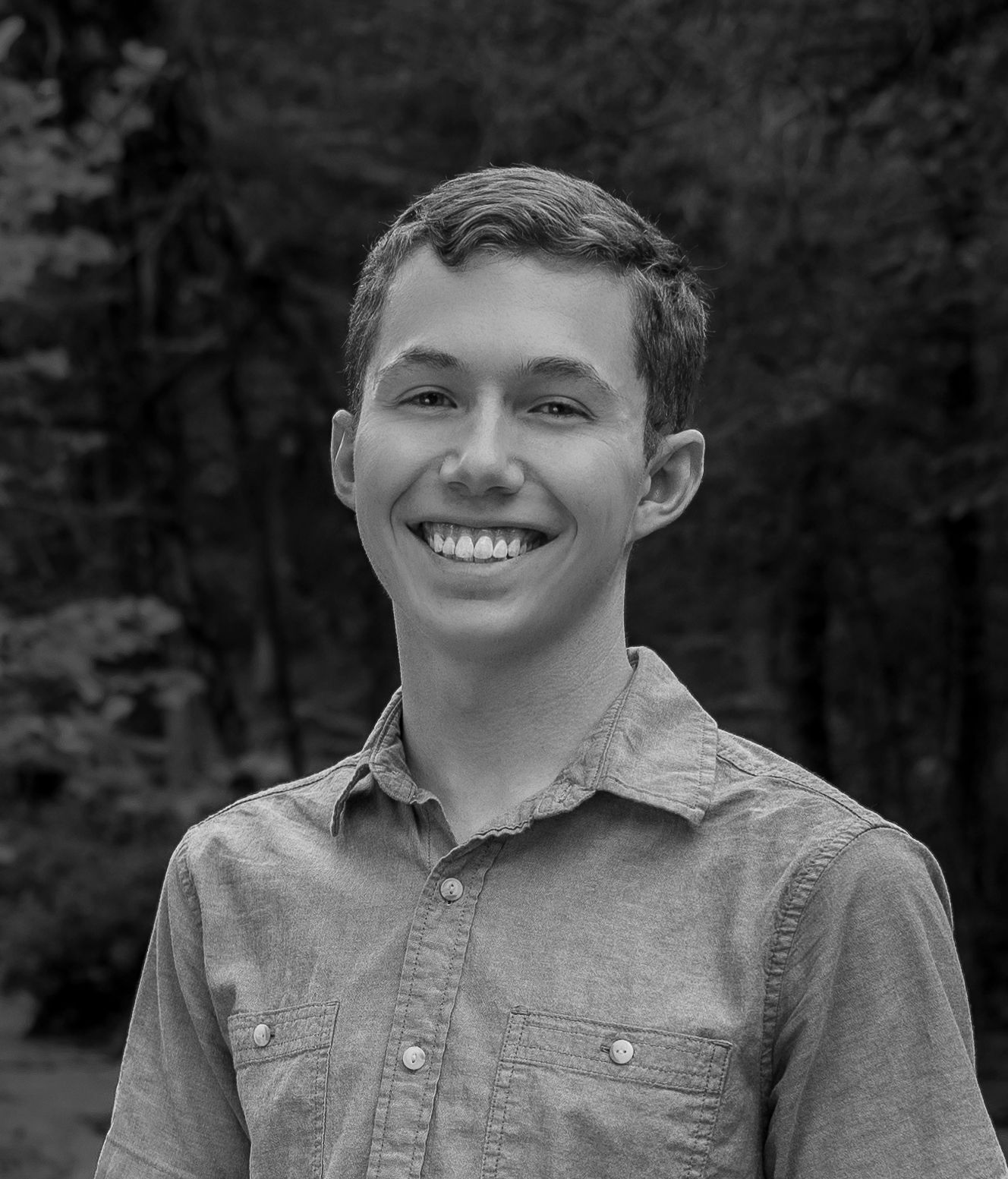 Professional headshot of Cade Claycomb, the owner of Cade Claycomb Photography.