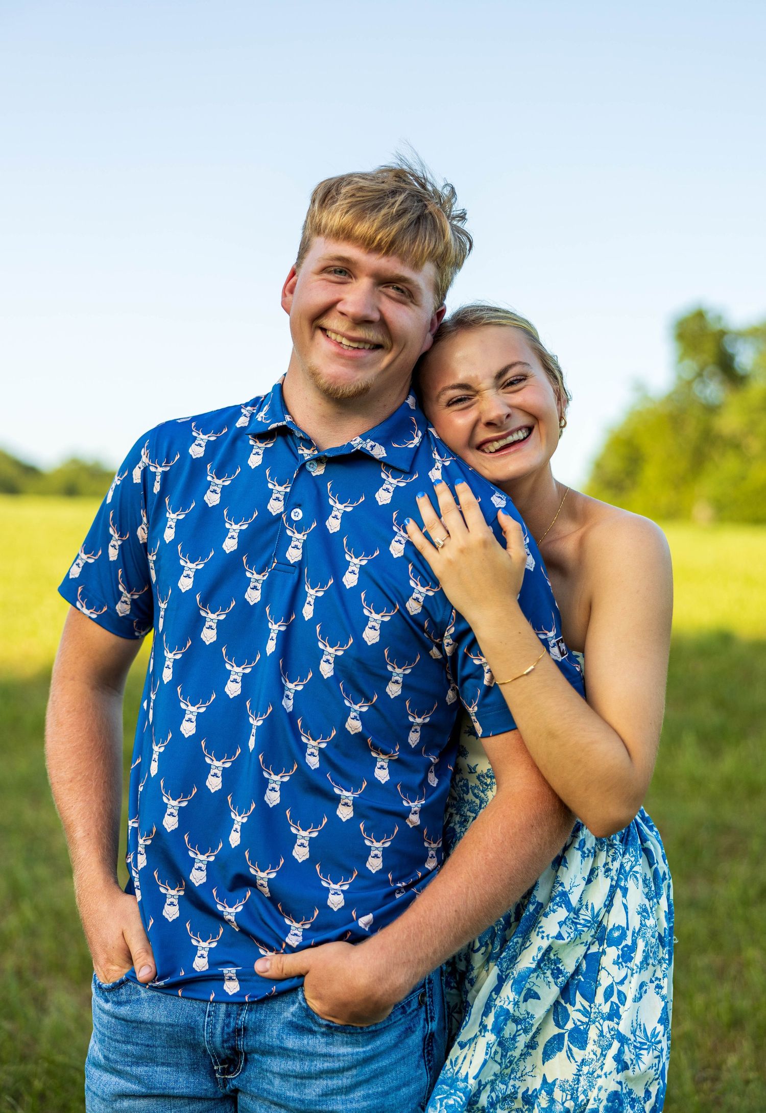 A couple(Man on the left, Women on the right) hugging.