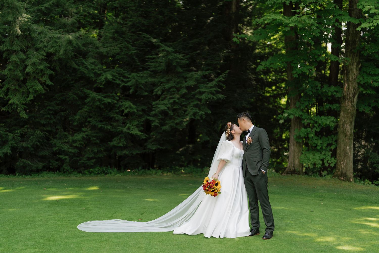 Romantic couple's portrait in a lush outdoor setting captured by AZ Photo Studio