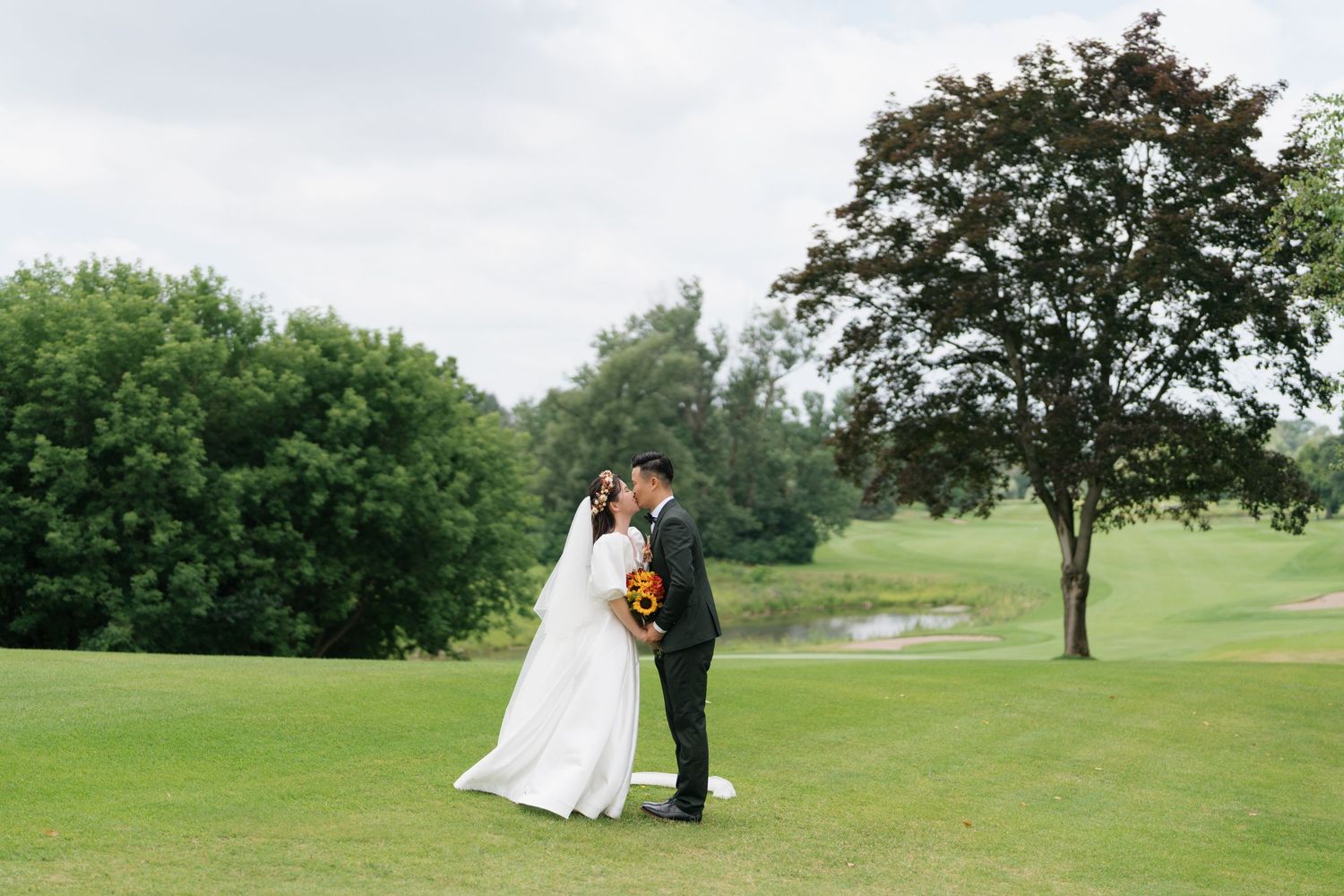Cinematic and vibrant outdoor wedding photography showcasing greenery captured by AZ Photo Studio