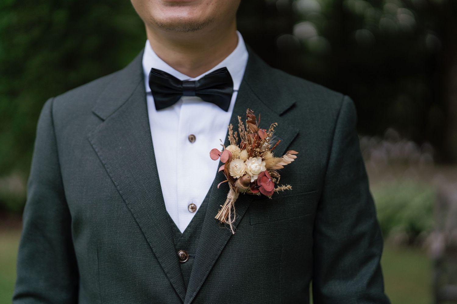 Groom's details shot: watch, cufflinks, and suit captured by AZ Photo Studio