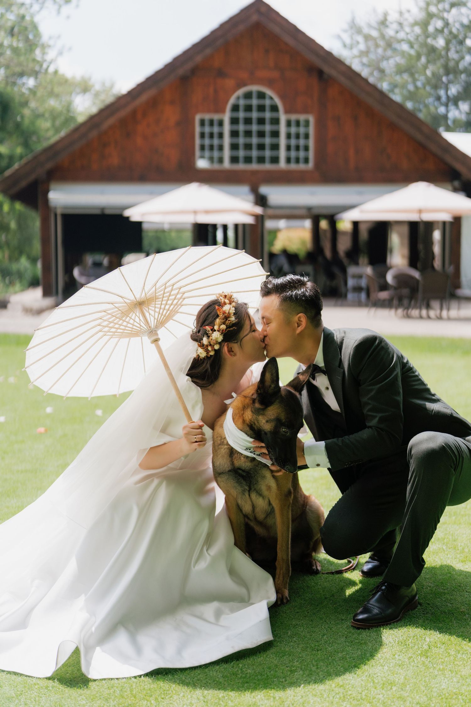 Bride and groom kissing on the scenic golf course at Pheasant Run Golf Club, AZ Photo Studio.