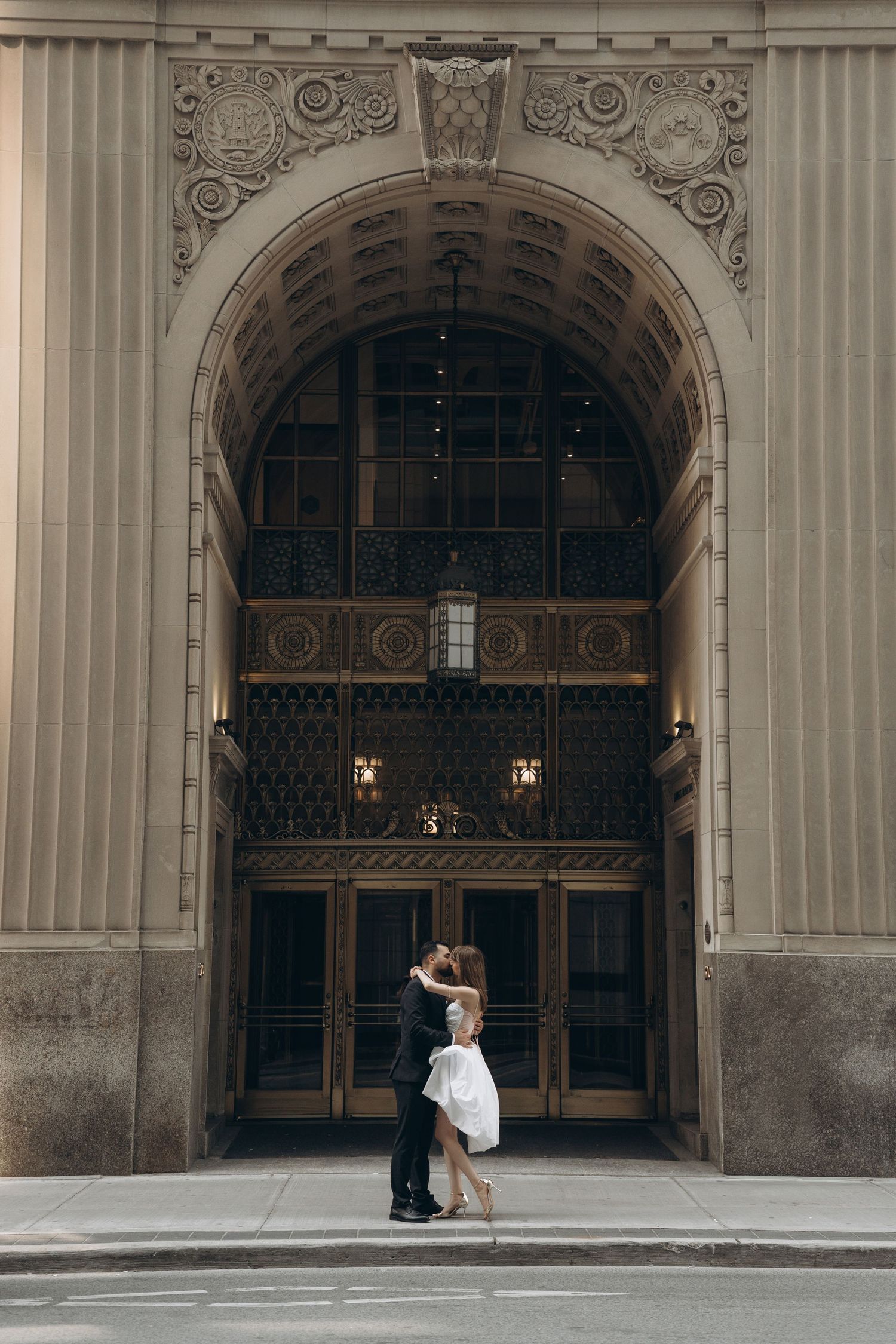 Triptych of architectural photos showing elegant stone archways with ornate details at a grand historic building entrance.