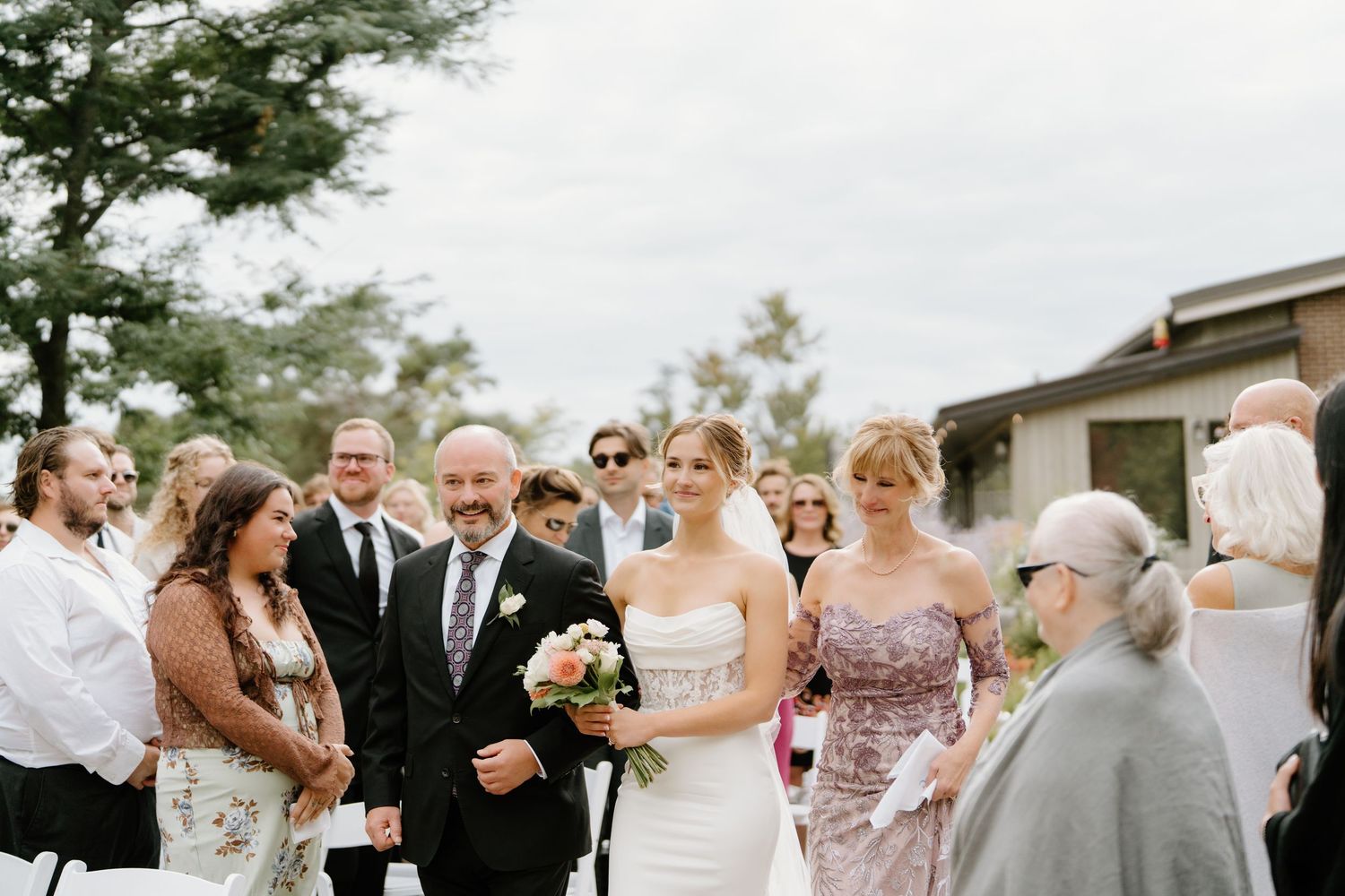 A collage of wedding celebration moments showing guests, dancing, and outdoor ceremony scenes.