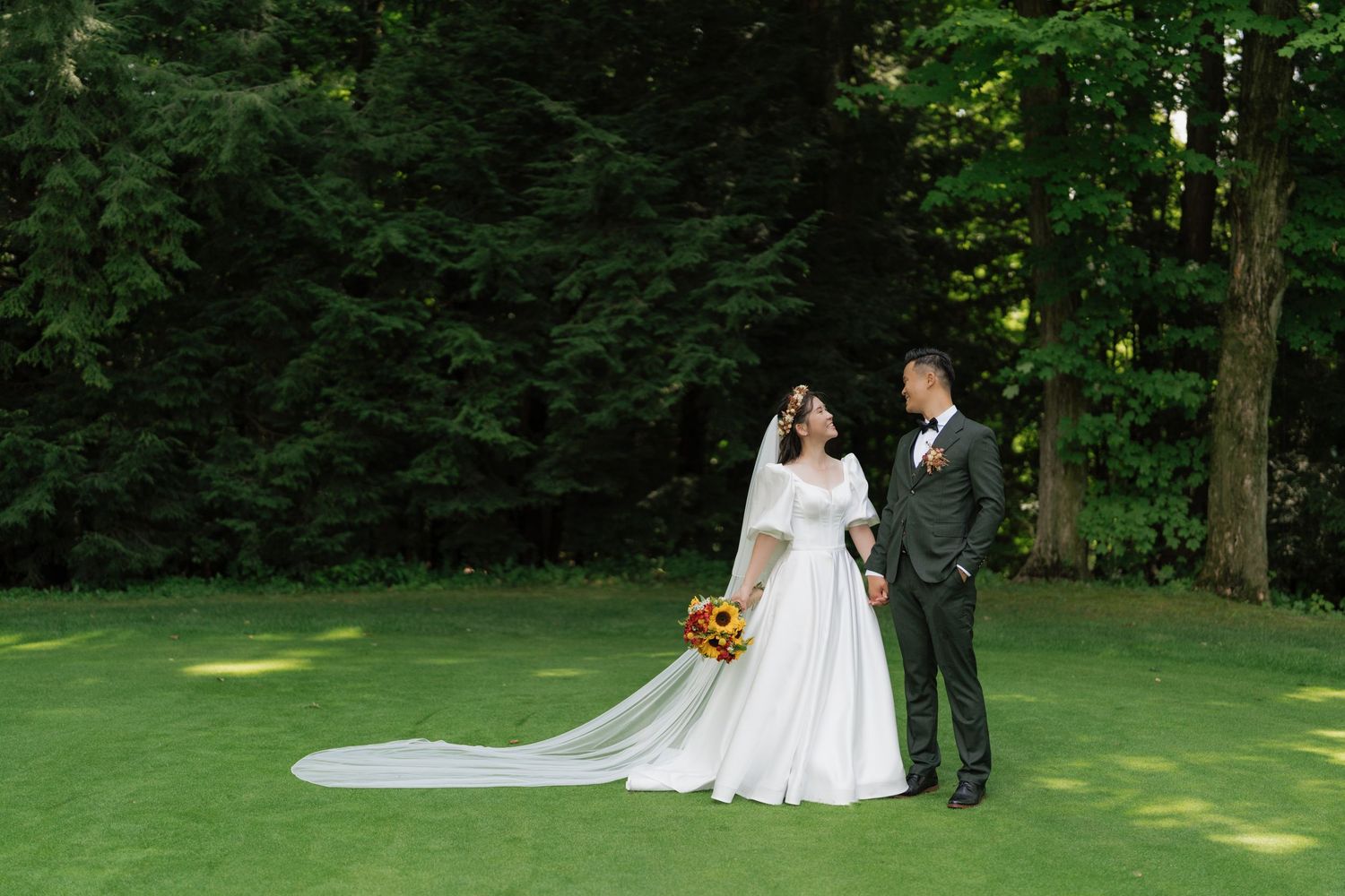 Couple's gentle stroll through a scenic park captured by AZ Photo Studio