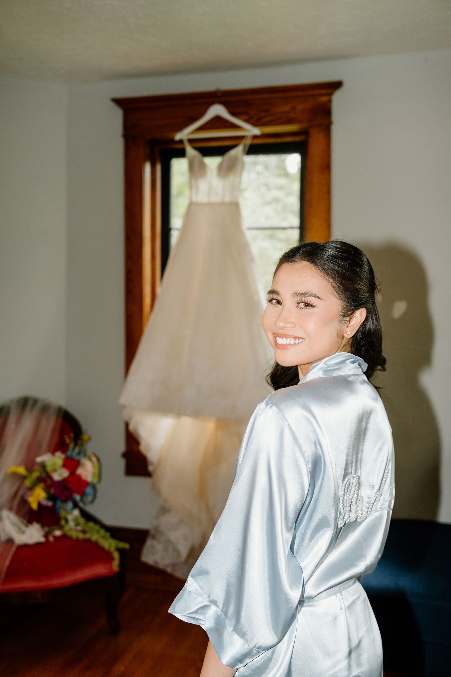 A sequence of wedding preparation photos showing a white bridal gown hanging and getting ready moments in a sunlit room.