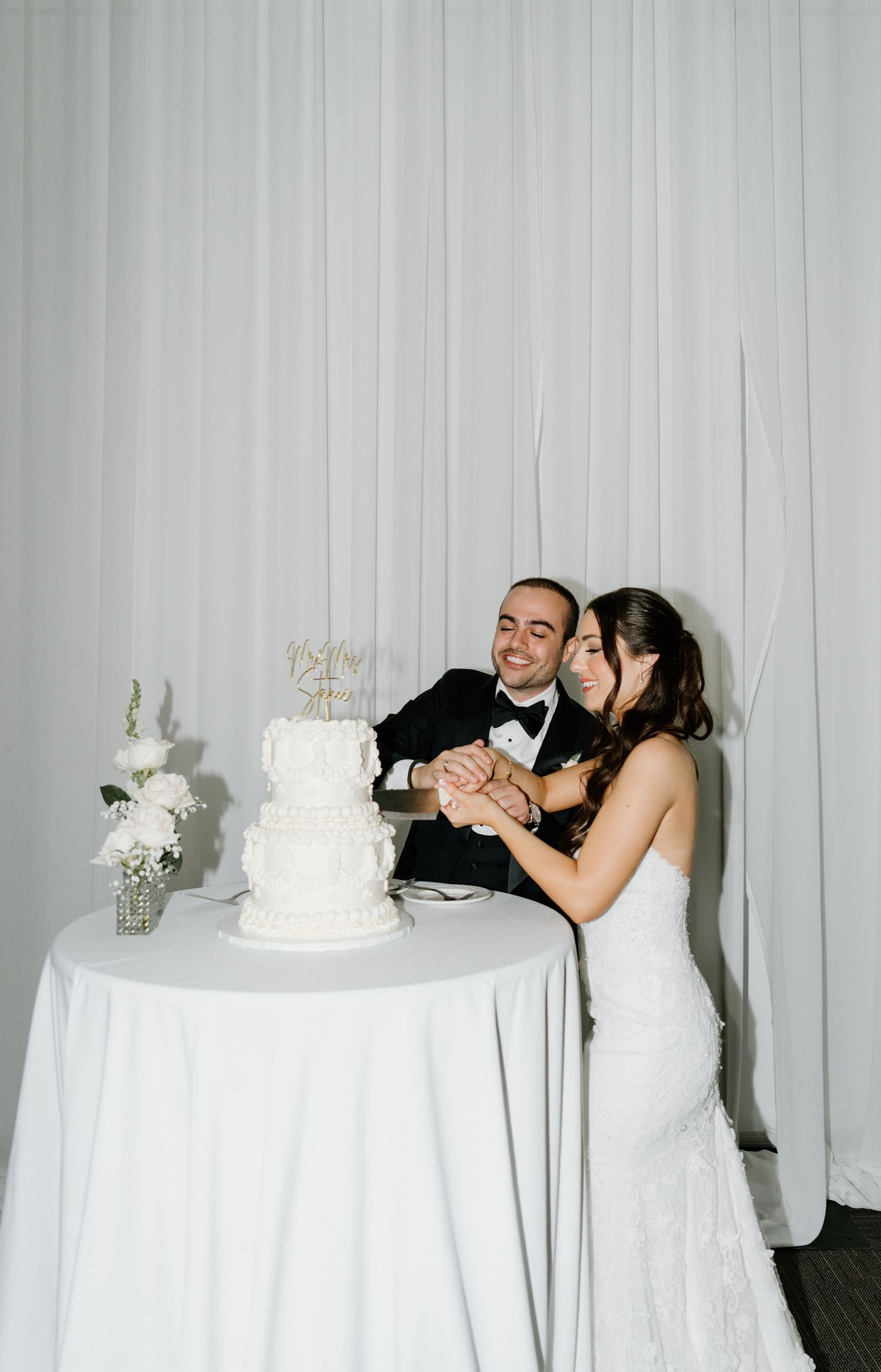 A series of wedding photos showing a couple dancing and sharing cake next to a white tiered wedding cake on a table.