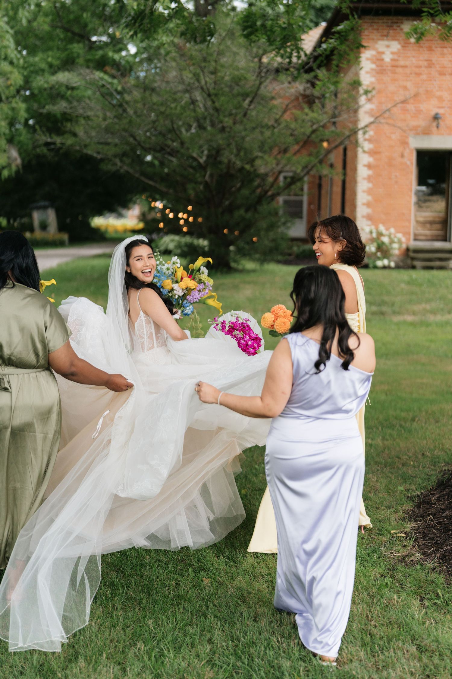 A series of images showing someone in white spinning joyfully with flowing fabric in a grassy outdoor setting.