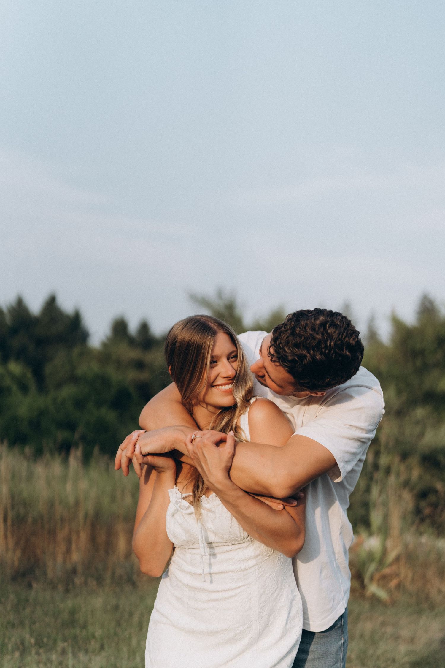 A romantic sequence of a couple embracing and dancing together captured by AZ Photo Studio.