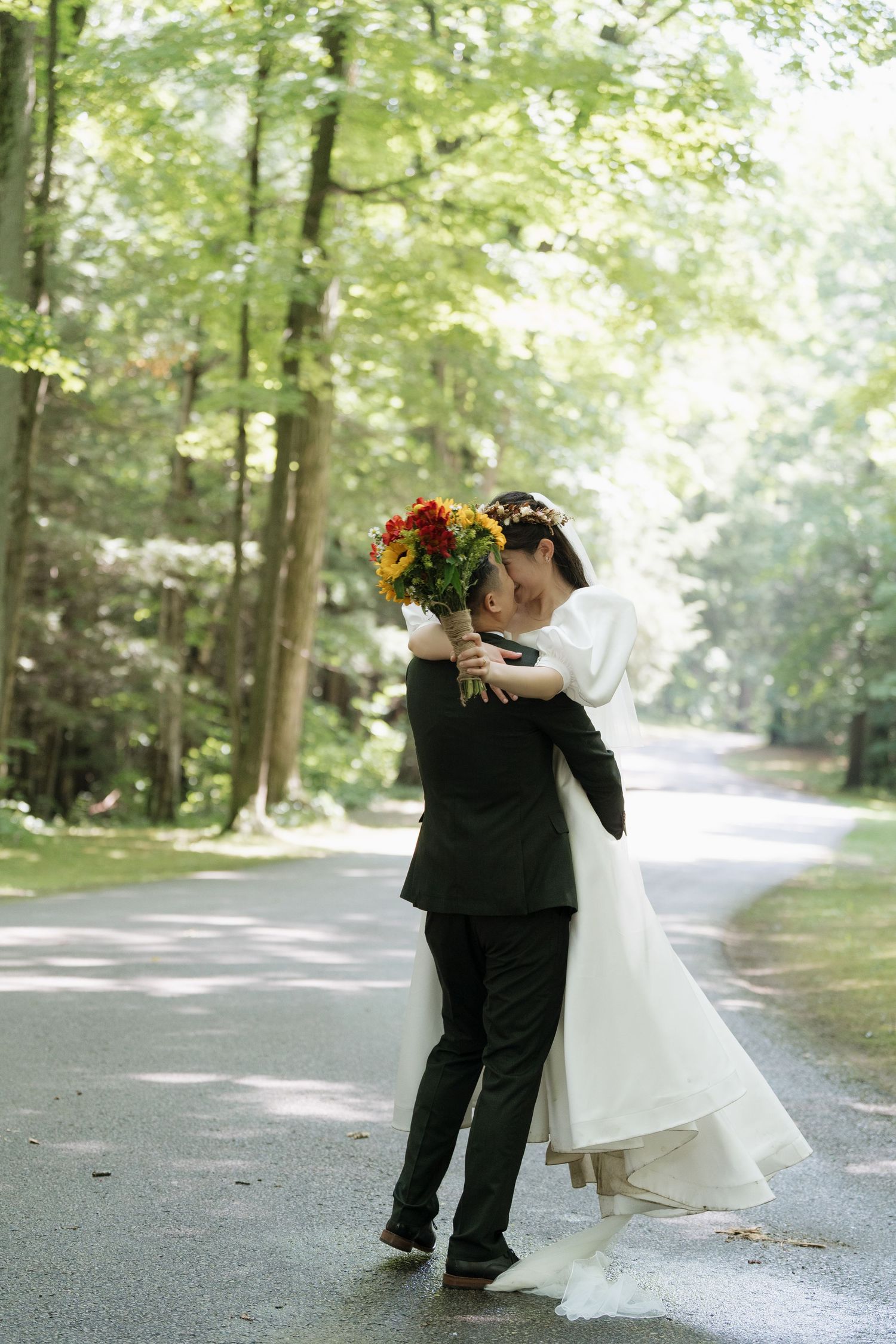 Couple's joyful moments under the clear blue sky captured by AZ Photo Studio