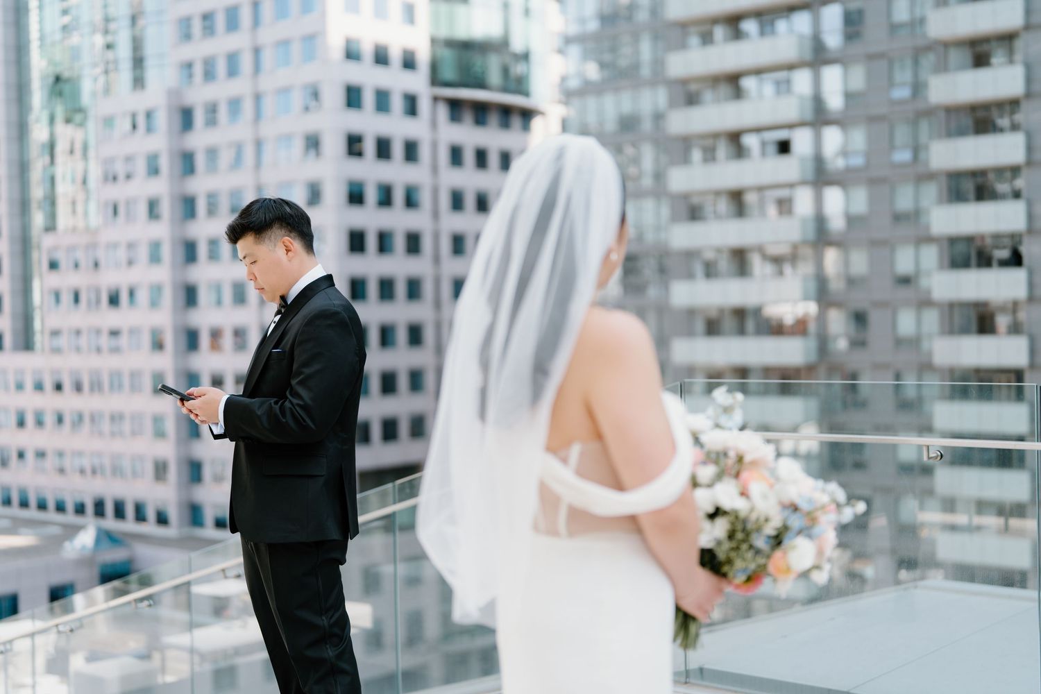 A collection of rooftop wedding photos showing a bride and groom against an urban cityscape backdrop.