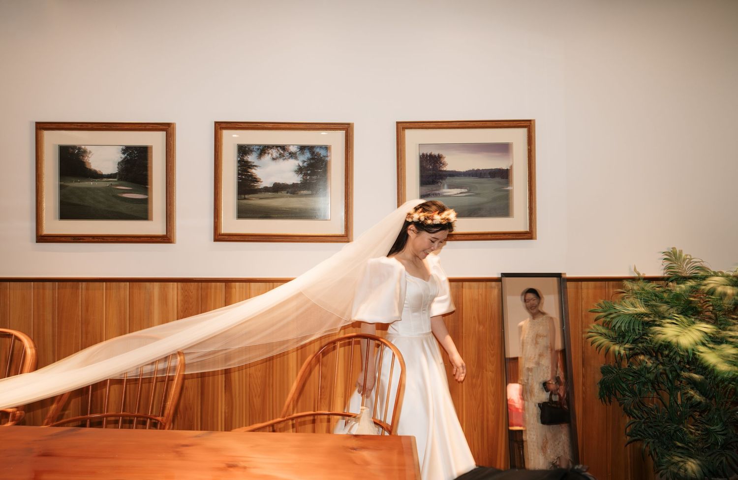 Bride's solo shot with elegant floral arrangements captured by AZ Photo Studio