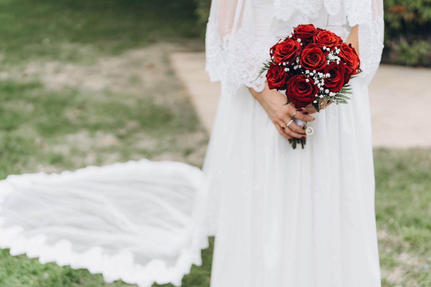 Wedding details collage featuring white bridal dress, red rose bouquet, and delicate lace details on an outdoor setting.