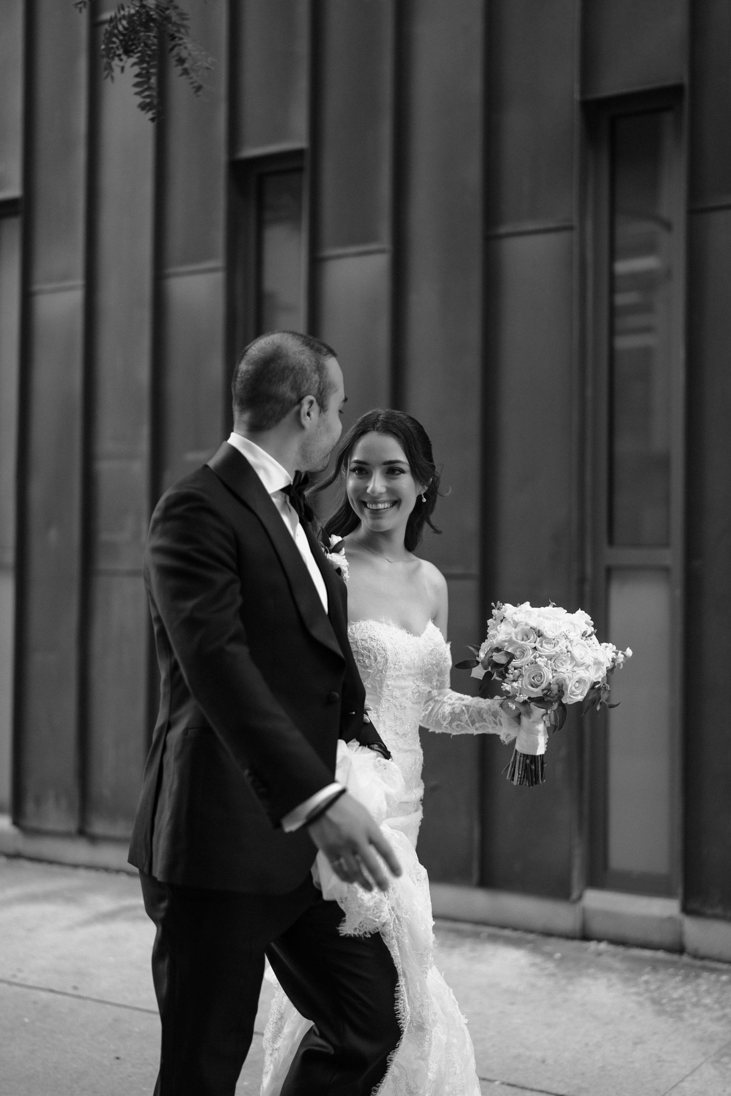 A black and white wedding photo series showing romantic moments between a couple in formal attire with white bouquets.