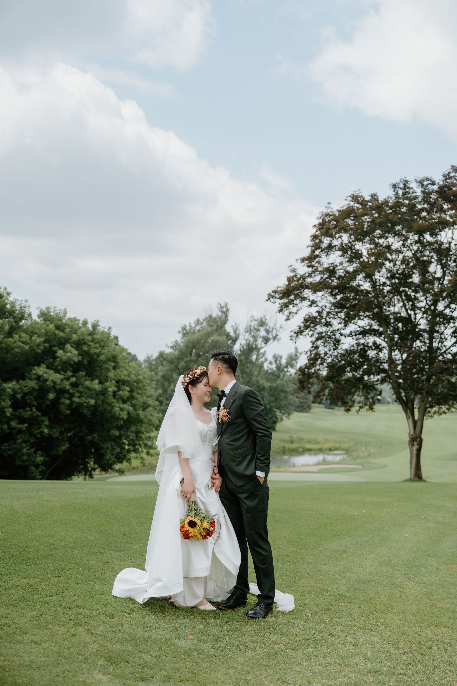 Capturing real moments with natural light in a spacious outdoor venue captured by AZ Photo Studio