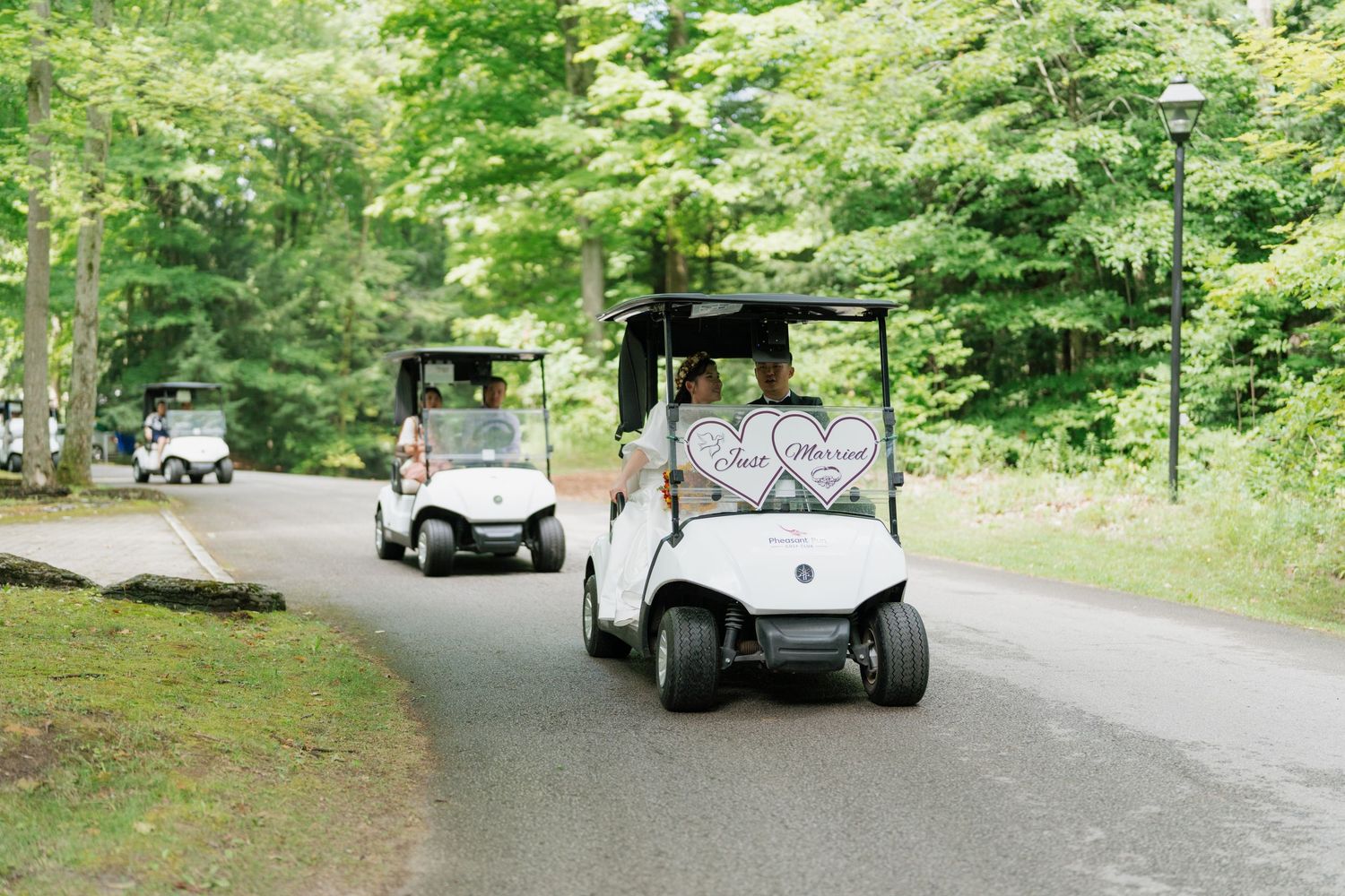 Bride and groom driving a golf cart at Pheasant Run Golf Club, AZ Photo Studio photography.