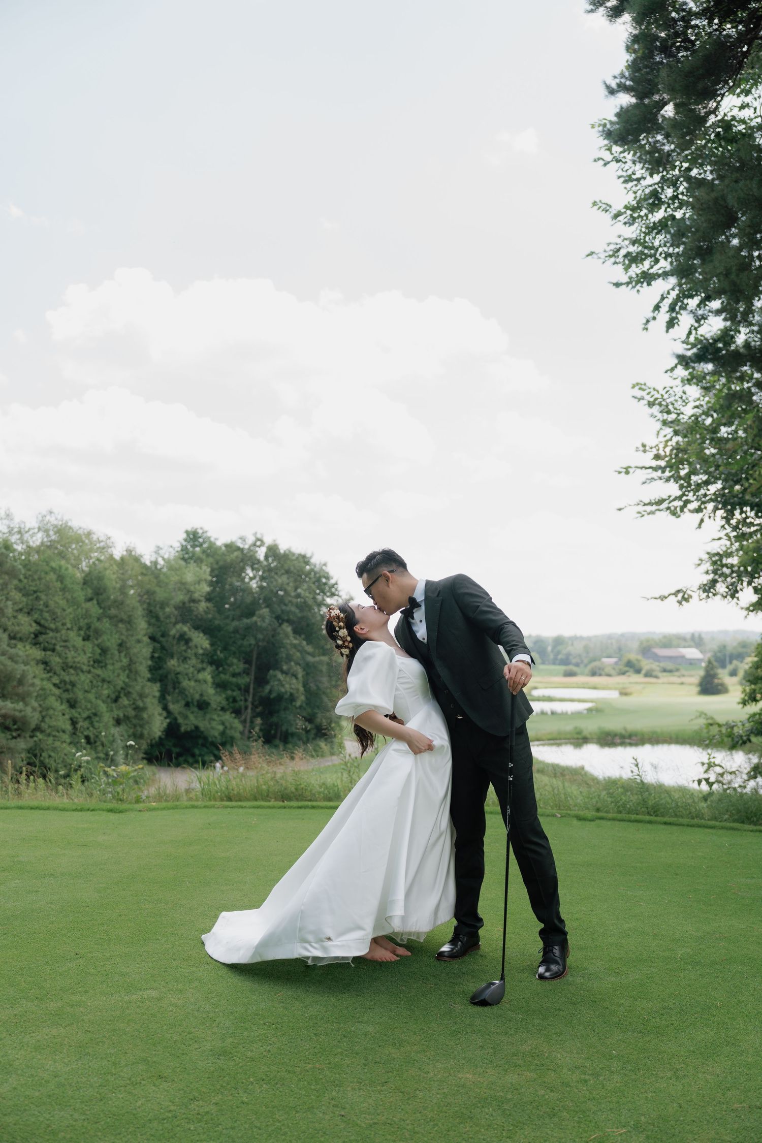 Deep kiss of bride and groom at Pheasant Run Golf Club, romantic wedding photography by AZ Photo Studio.