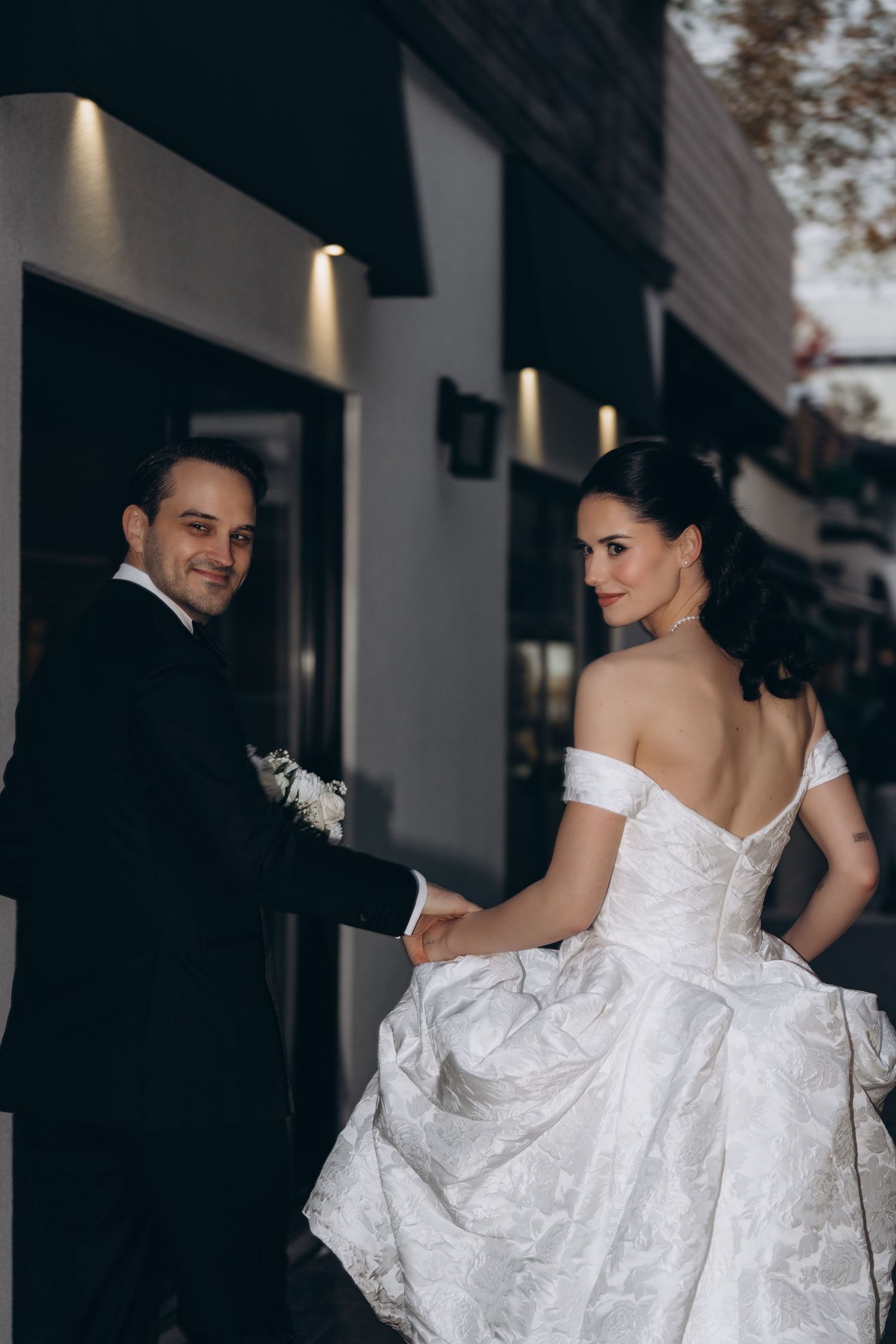 A sequence of wedding photos showing a bride in a white off-shoulder gown dancing and twirling on a dark background.