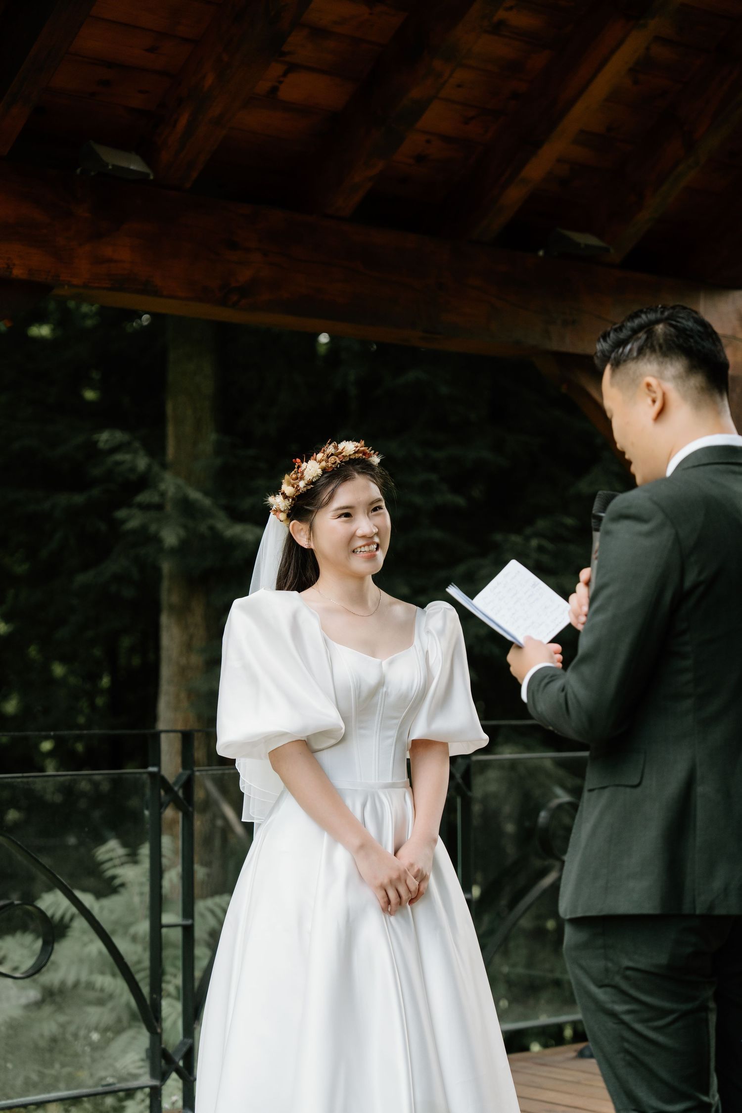 Reading vowels in outdoor wedding ceremony captured by AZ Photo Studio