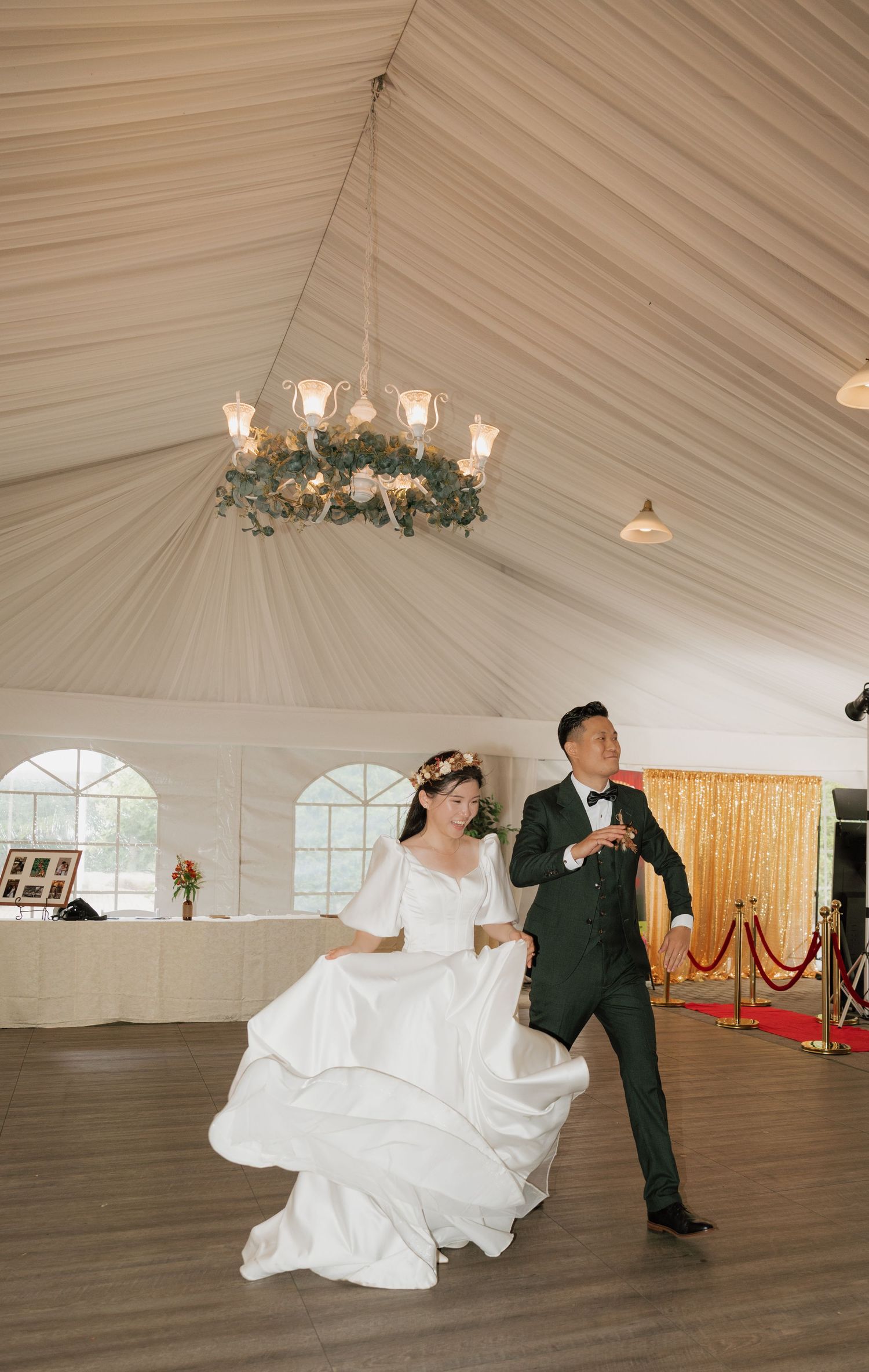 Grand entrance of the newlyweds into a beautifully decorated wedding hall in Toronto, photography by AZ Photo Studio.