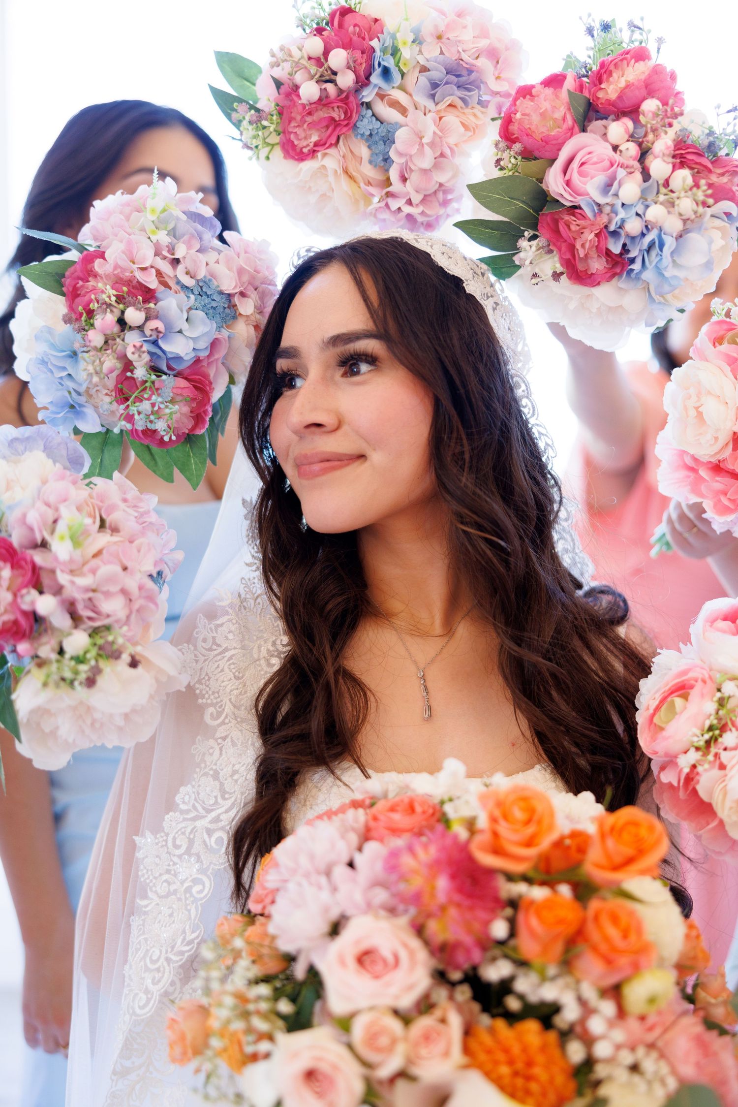 Bridal portraits with romantic floral crown and colorful rose bouquet.