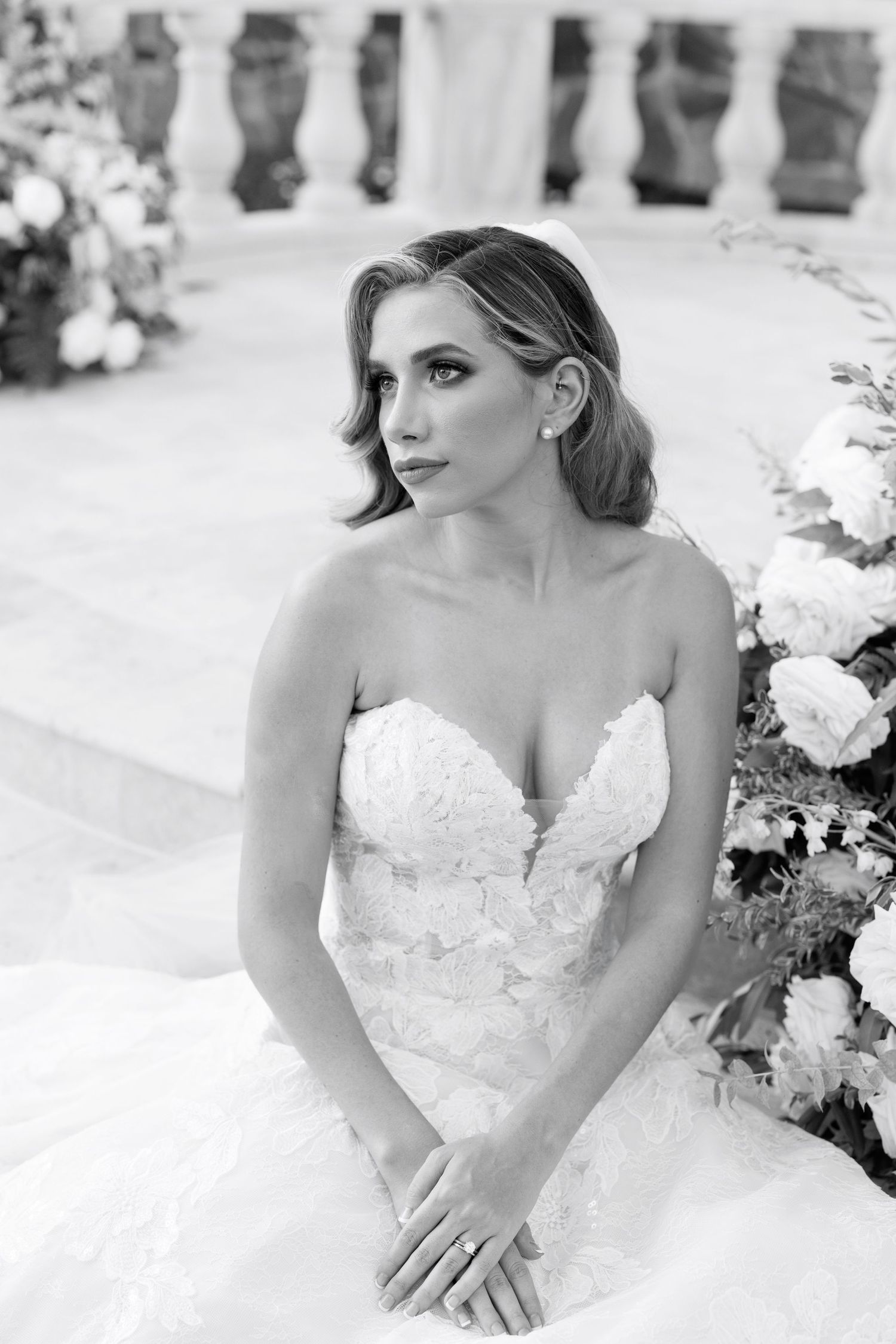 Ethereal black and white bridal portraits featuring a strapless lace wedding gown.