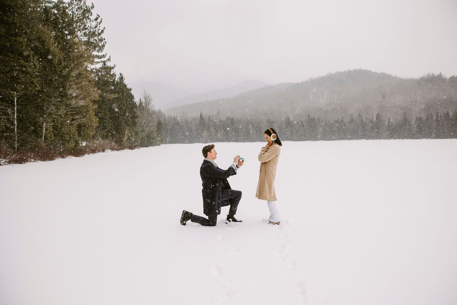 surprise proposal during winter wonderland in the adirondacks
