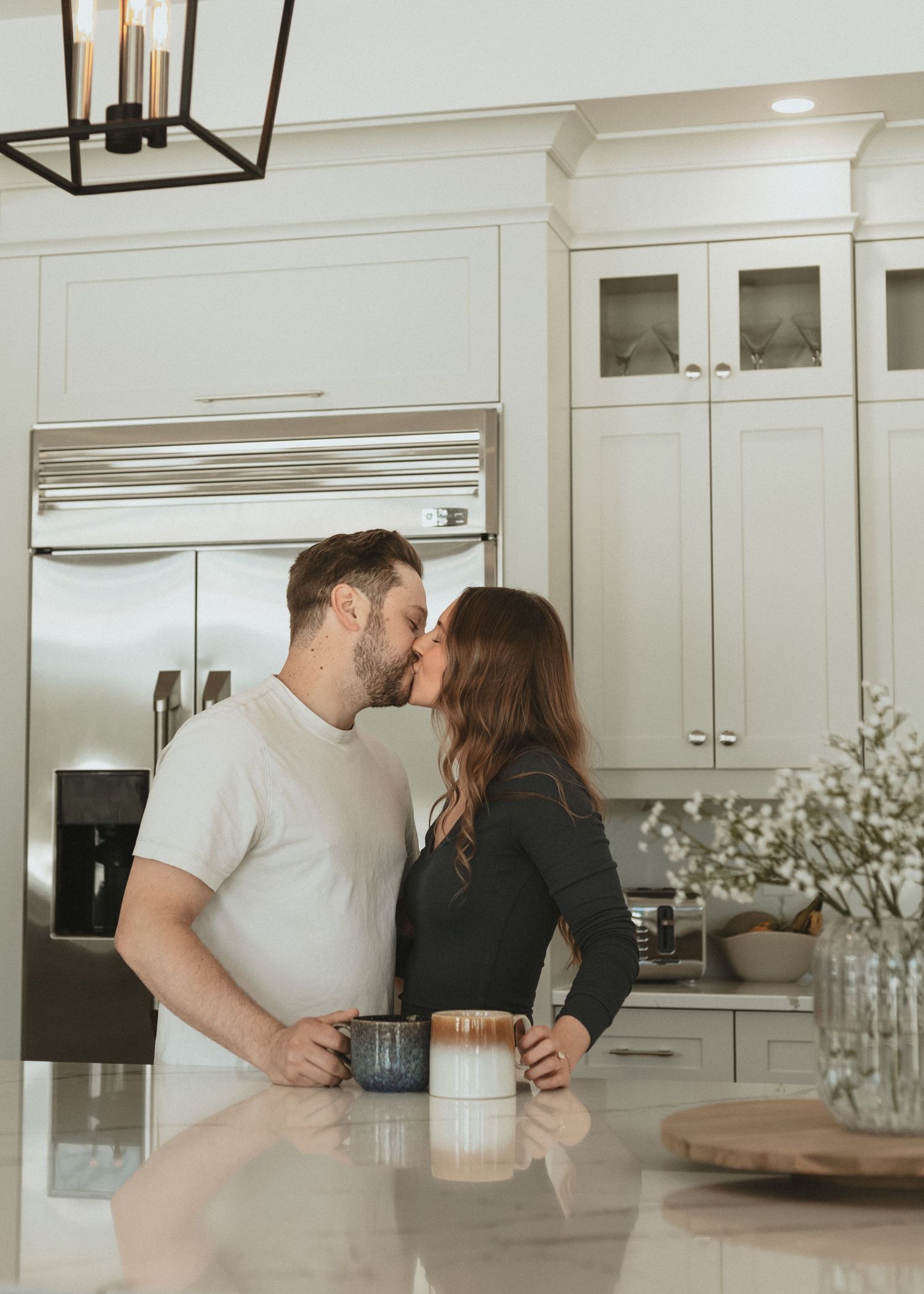 Local Sudbury Ontario Photographer captures beautiful in home engagement session couple dancing