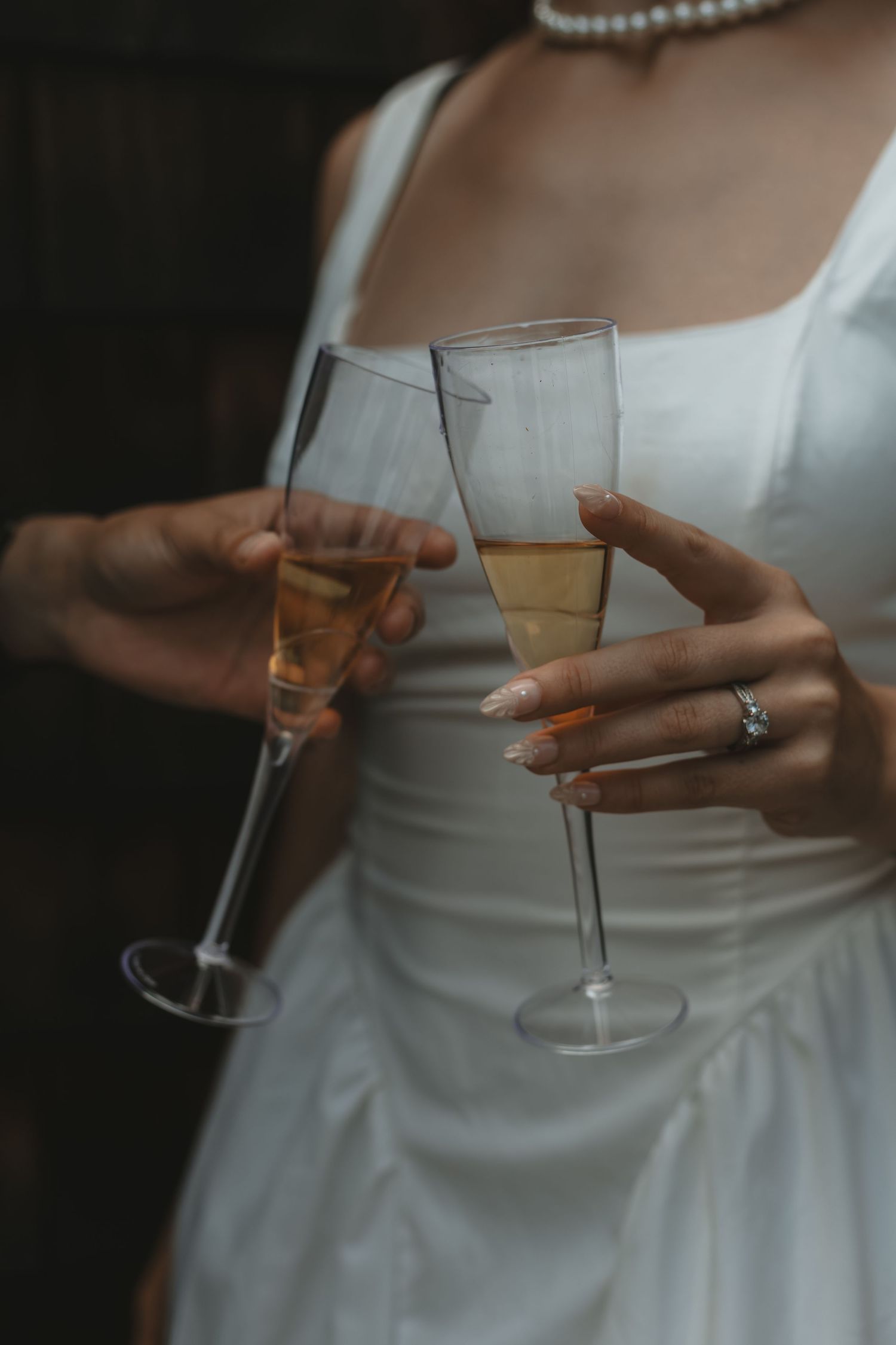 Wedding Photographer in Sudbury Ontario captures champagne toast