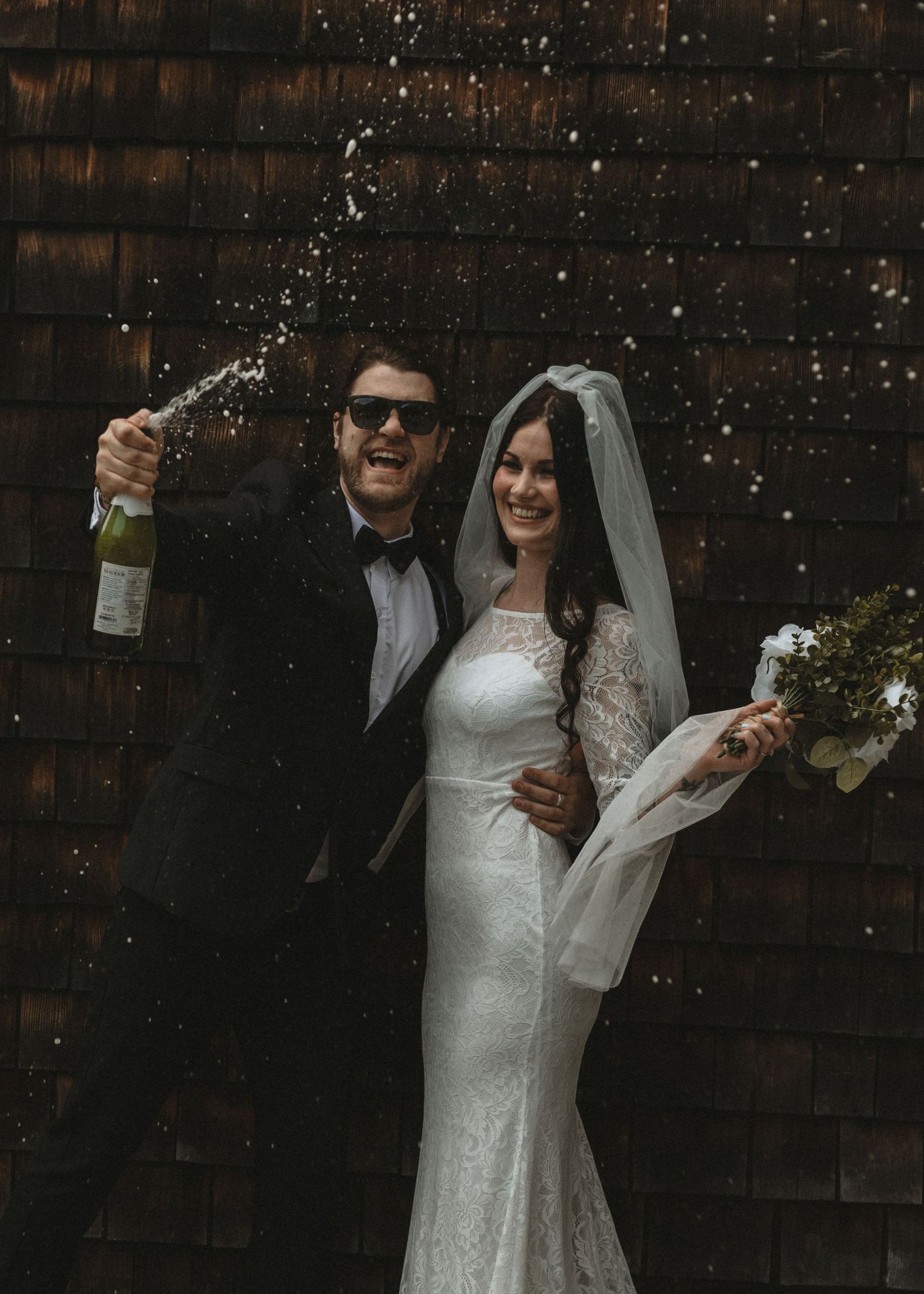 Local Sudbury Wedding Photographer captures bride and groom on wedding day in Sudbury ontario champagne toast