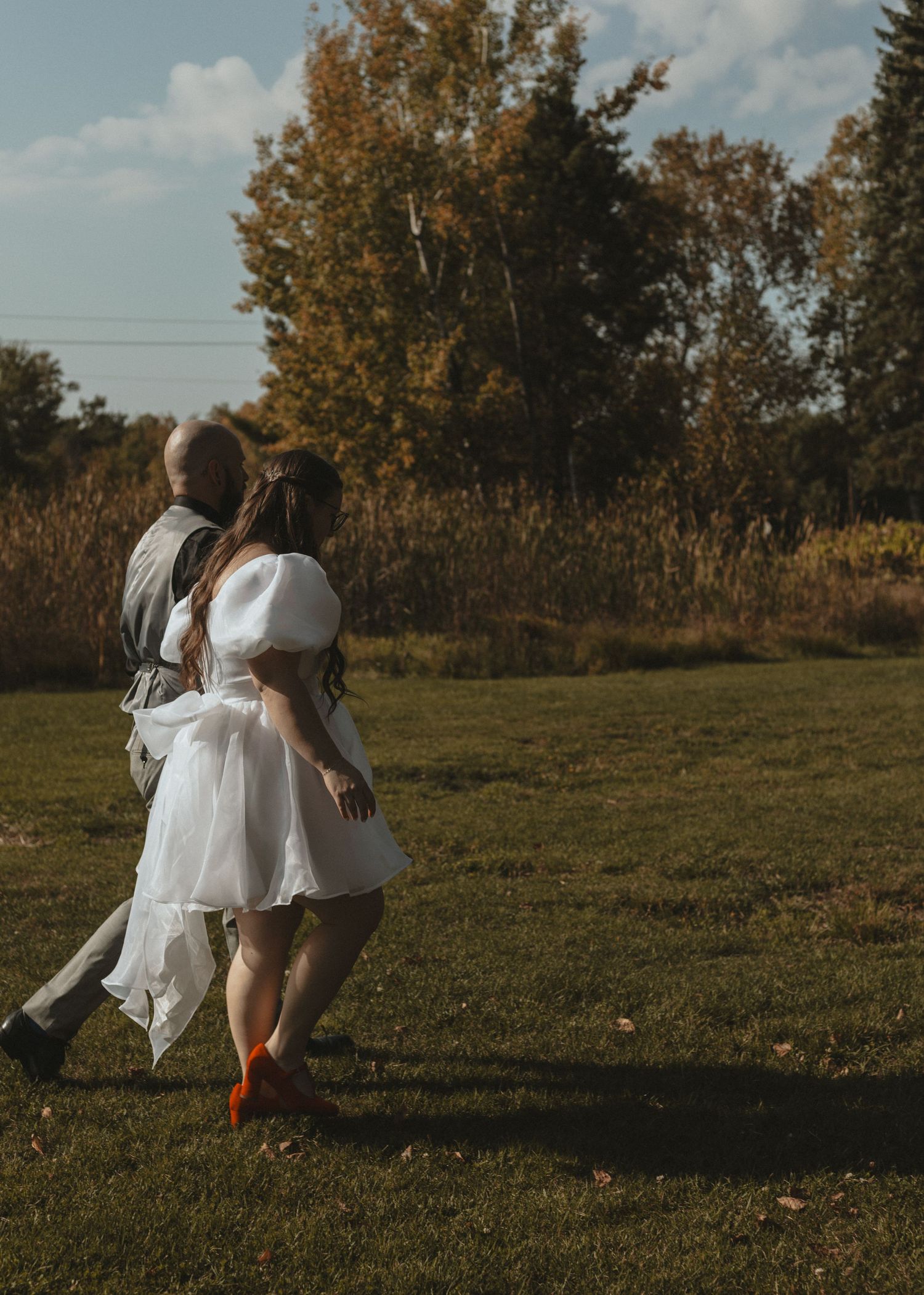 Local Sudbury Ontario Wedding Photographer captures bride and groom on wedding day in Sudbury ontario dancing having fun