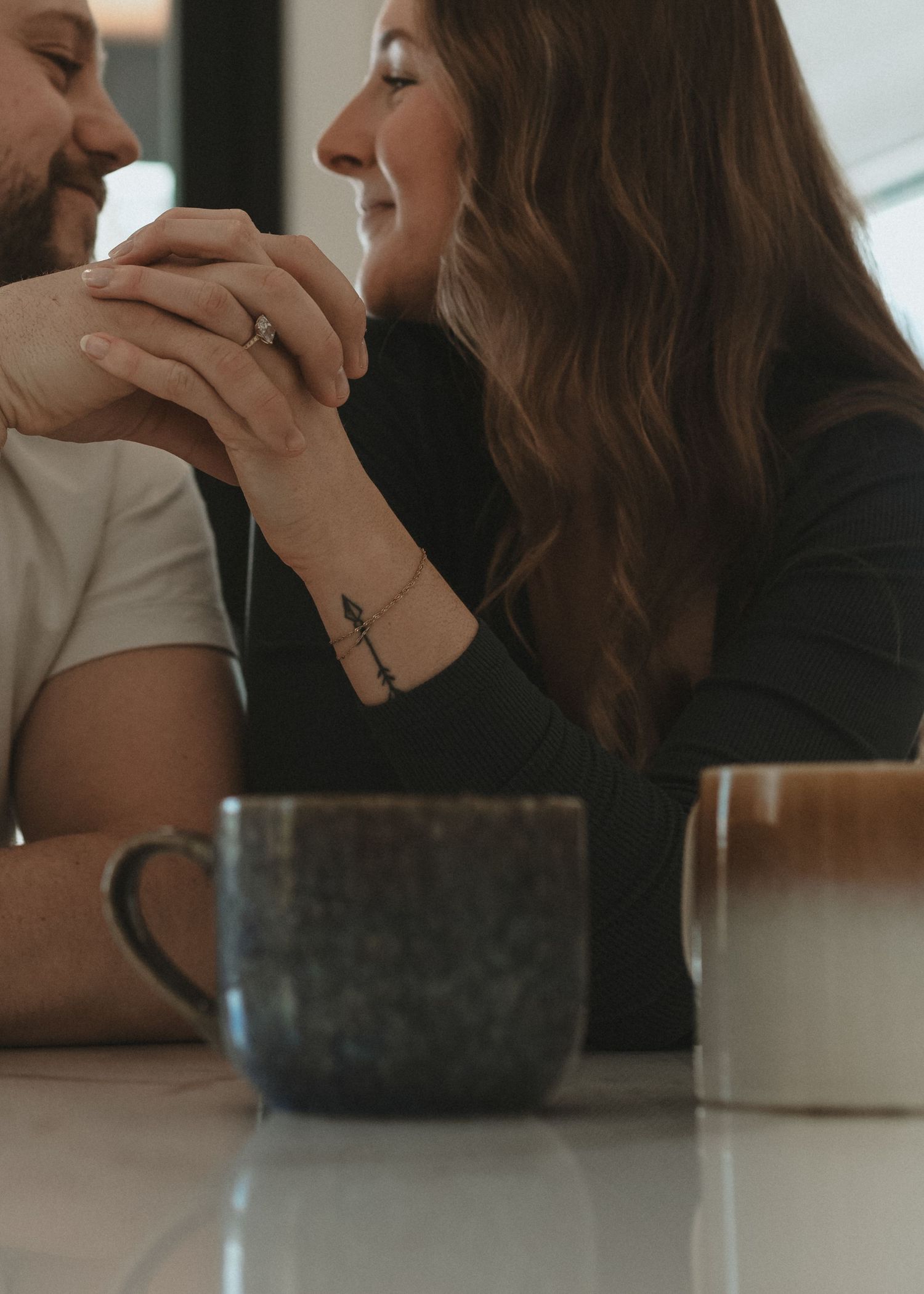 Local Sudbury Ontario Photographer captures beautiful in home engagement session couple dancing