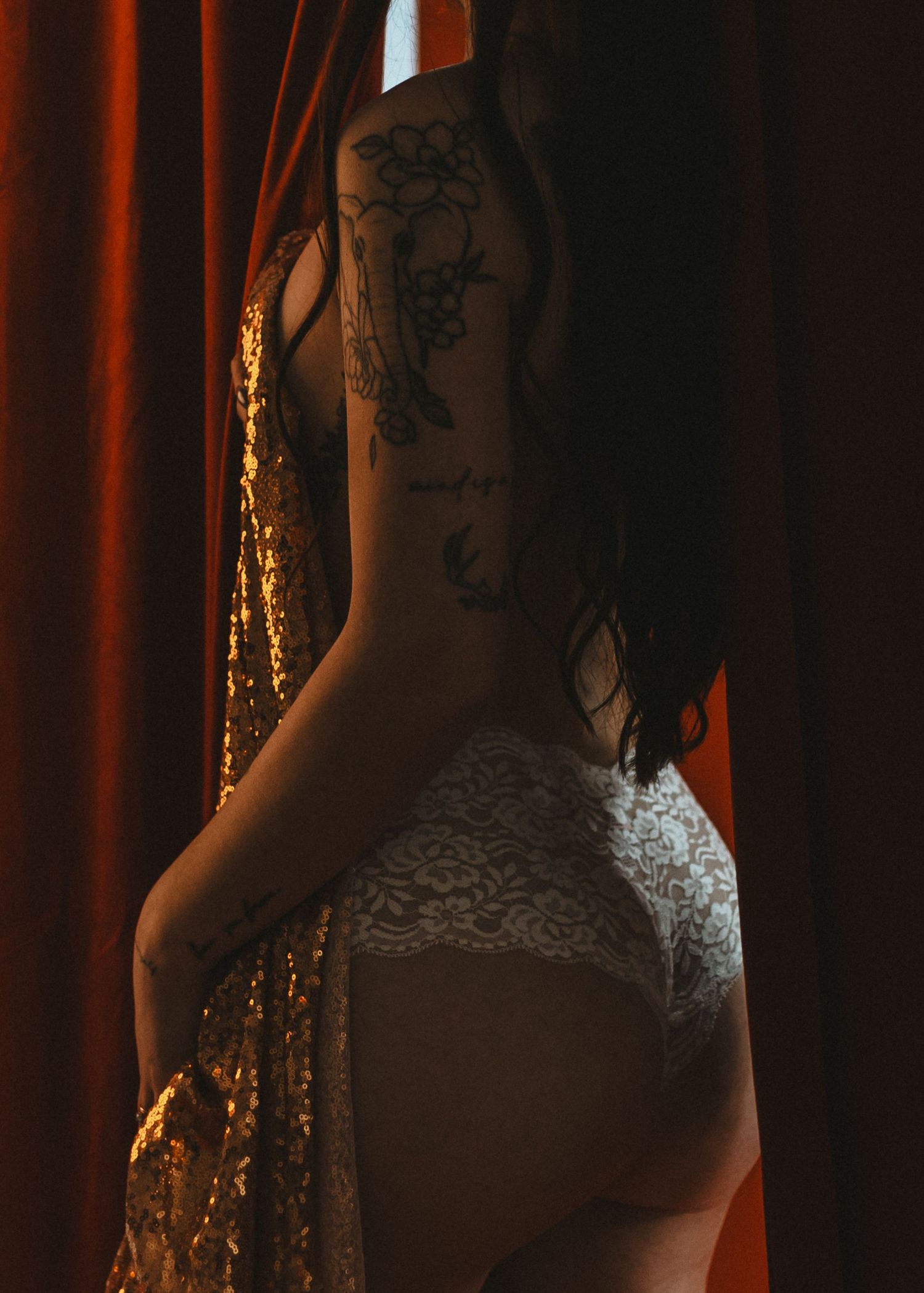 local Sudbury Boudoir expert provides boudoir photoshoot experience in white lingerie