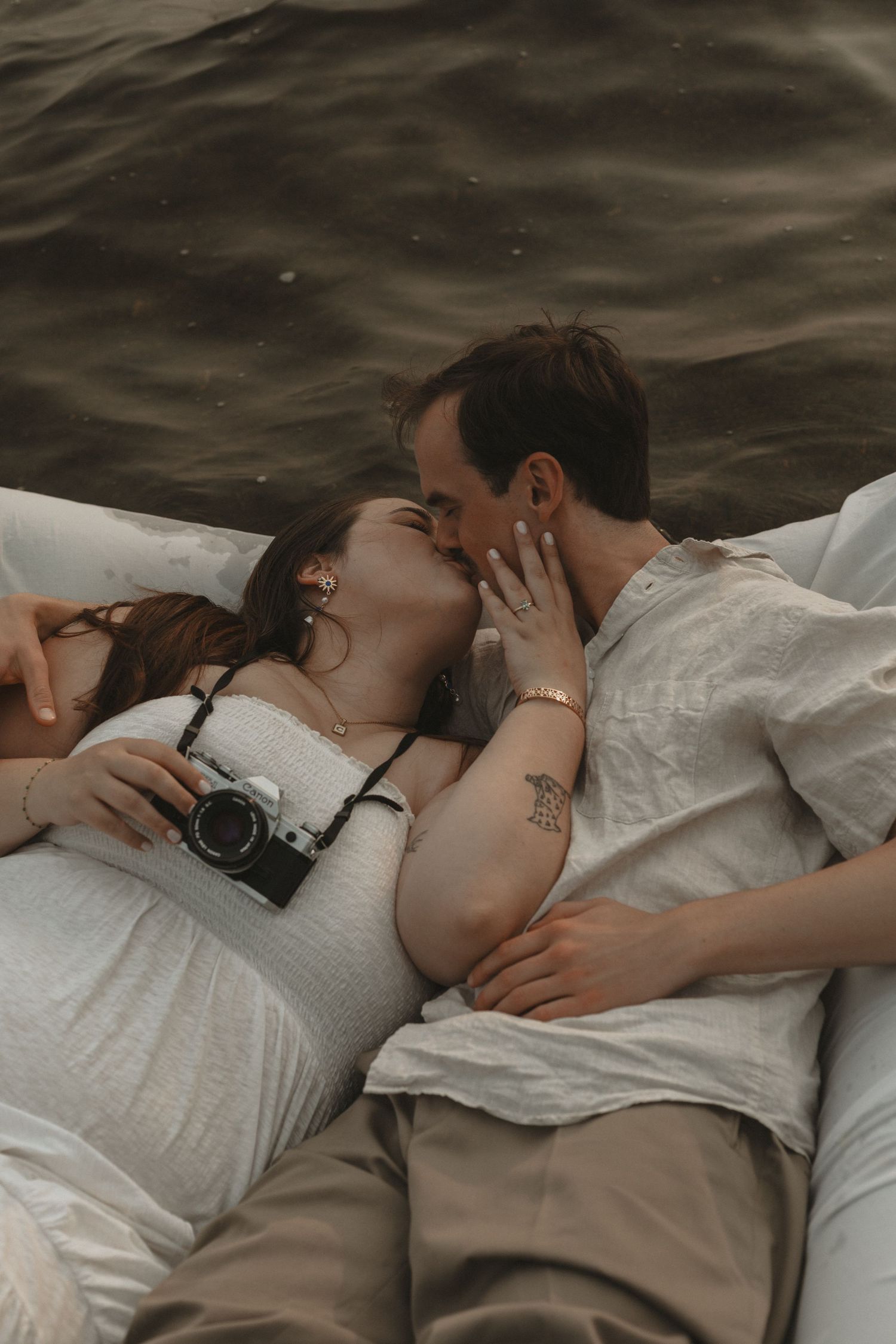 Local Sudbury Ontario Photographer near me captures water filled engagement photoshoot at Kalmo Beach in Val Caron