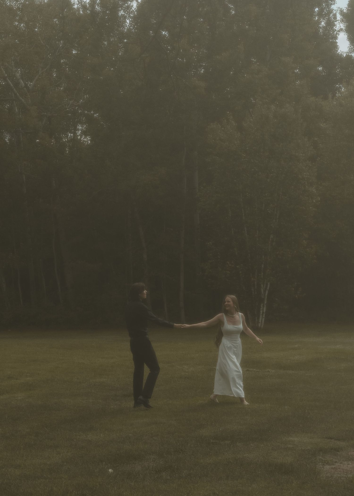 Local Sudbury Photographer captures couple dancing at engagement photoshoot at Fielding Memorial Park in Sudbury Ontario