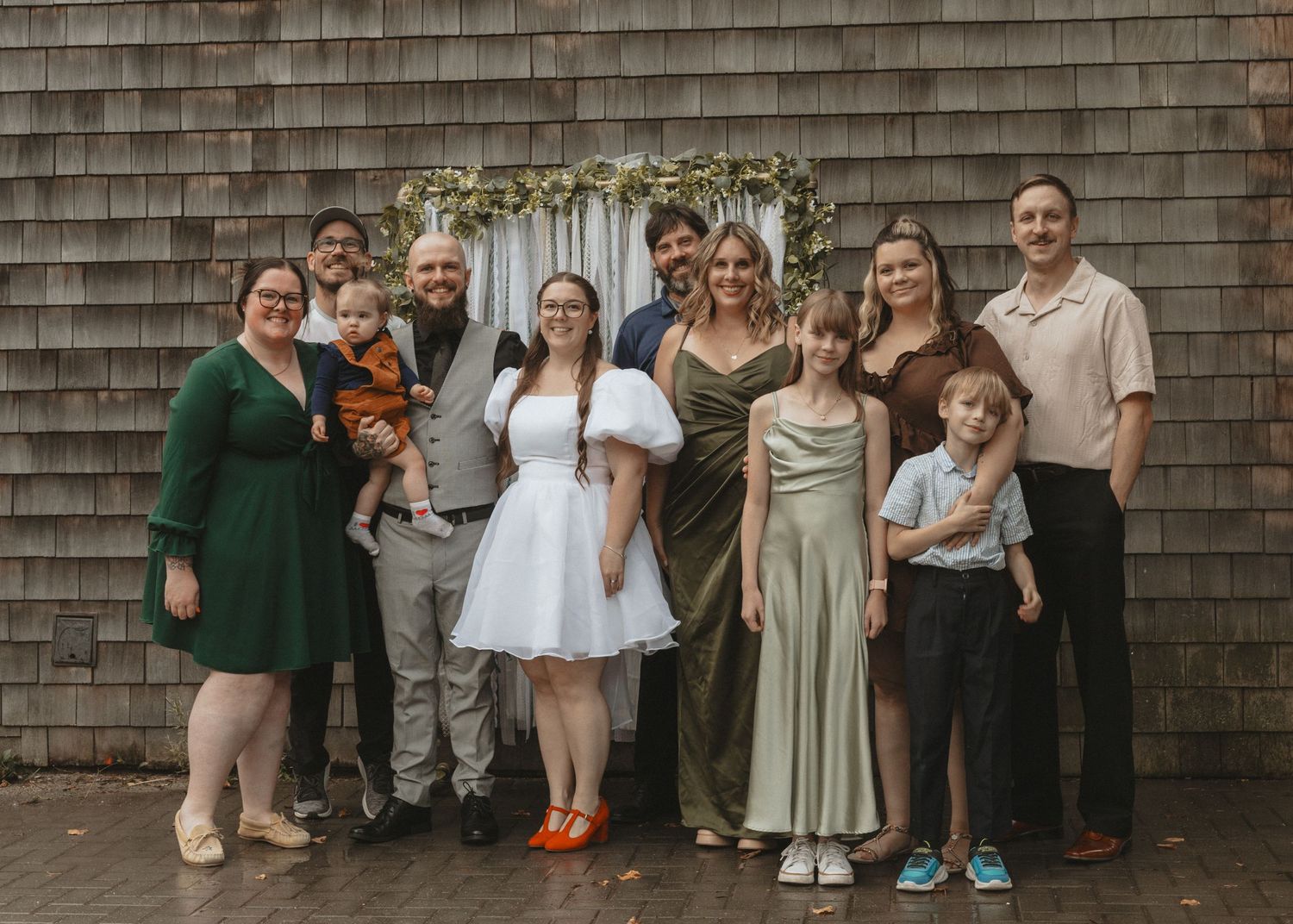 Local Sudbury Wedding Photographer captures bride and groom and friends on wedding day in Sudbury ontario dancing having fun
