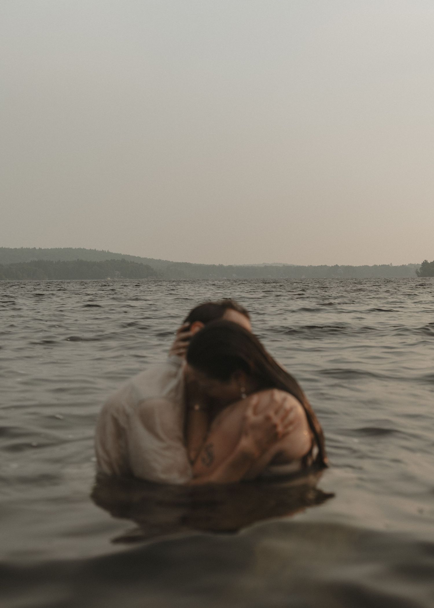Local Sudbury Ontario Photographer captures engagement photoshoot at Kalmo Beach in Val Caron